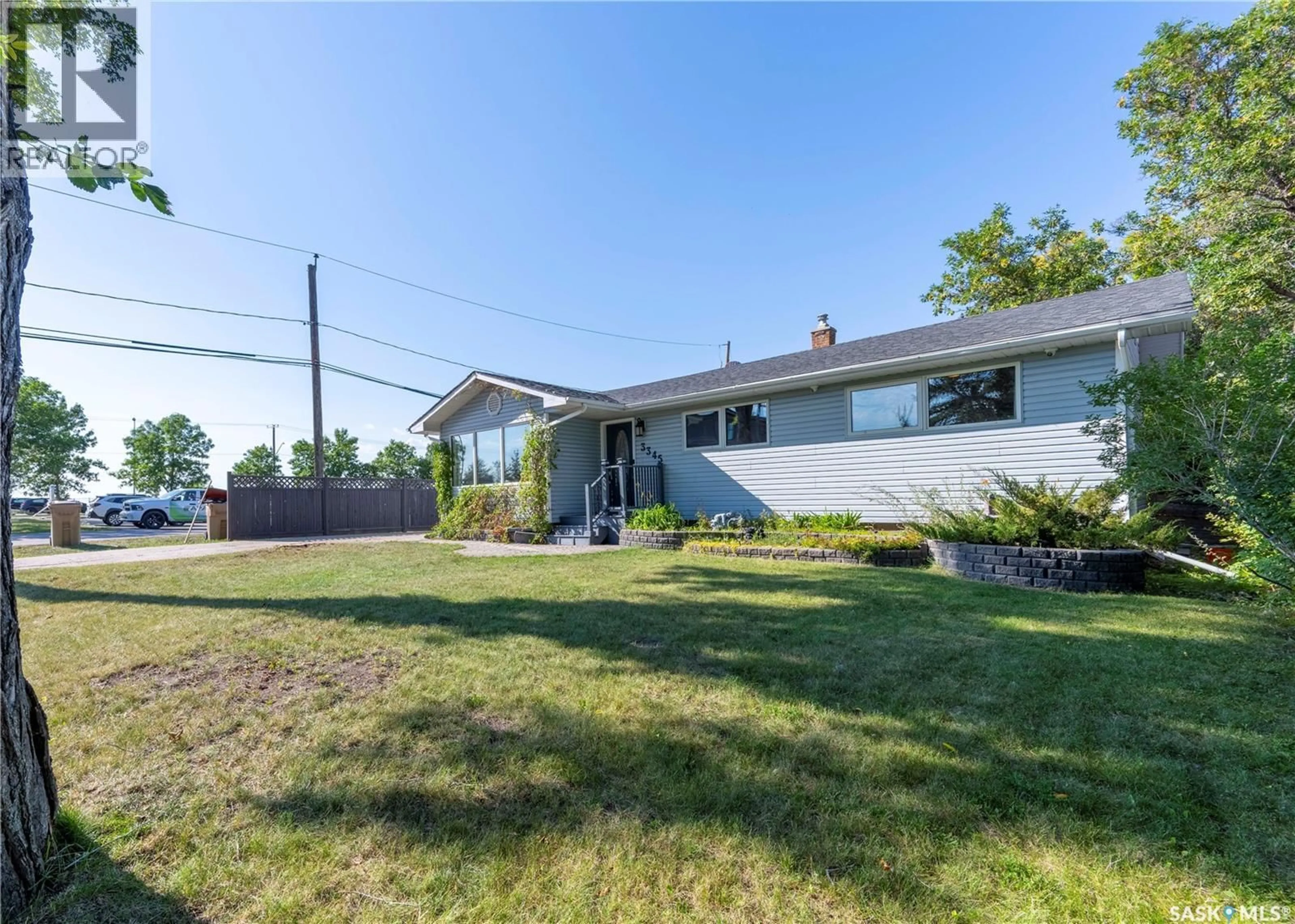 A pic from outside/outdoor area/front of a property/back of a property/a pic from drone, street for 3345 WASCANA STREET, Regina Saskatchewan S4S2H2