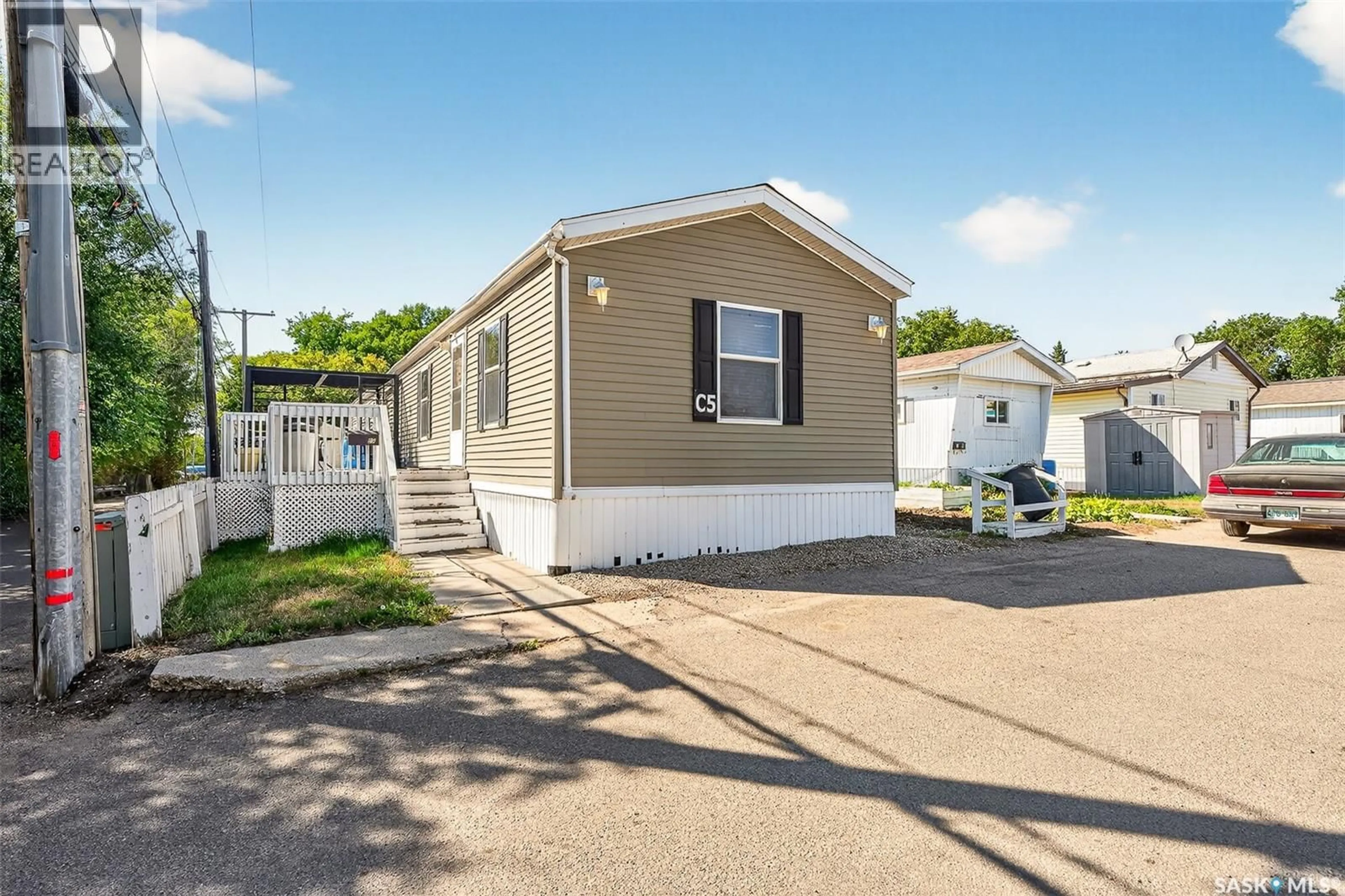 Home with vinyl exterior material, street for 5 C AVENUE, Moose Jaw Saskatchewan S6H1P3