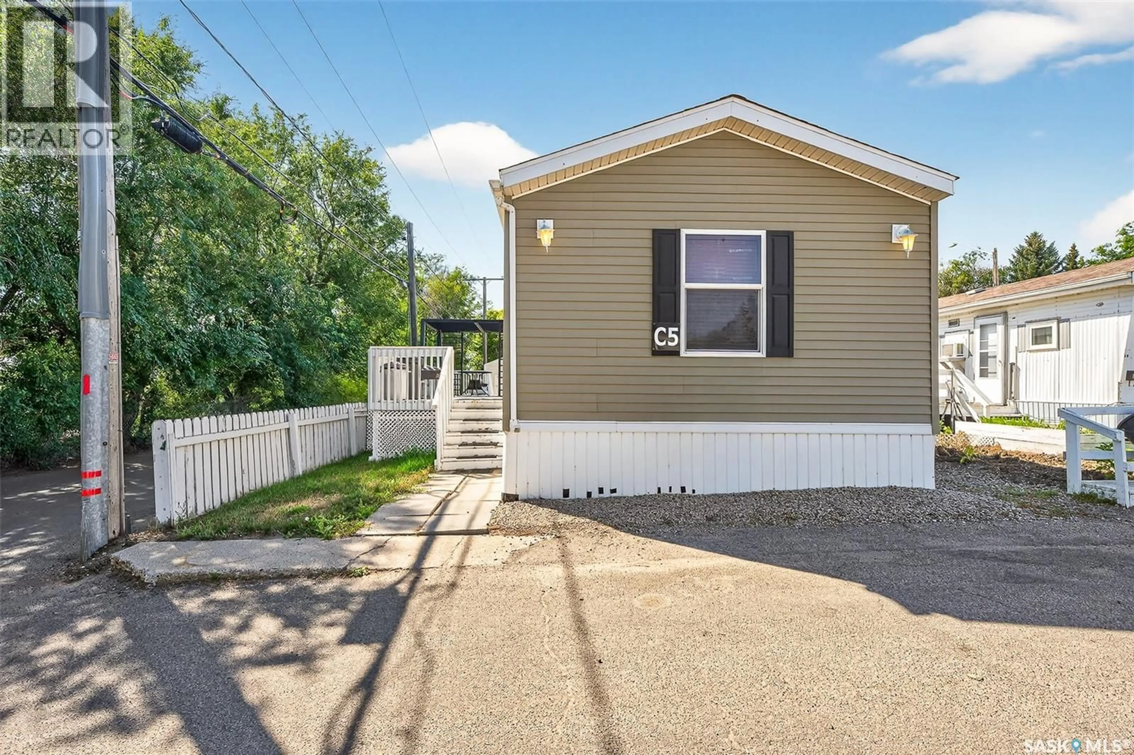 Home with vinyl exterior material, street for 5 C AVENUE, Moose Jaw Saskatchewan S6H1P3