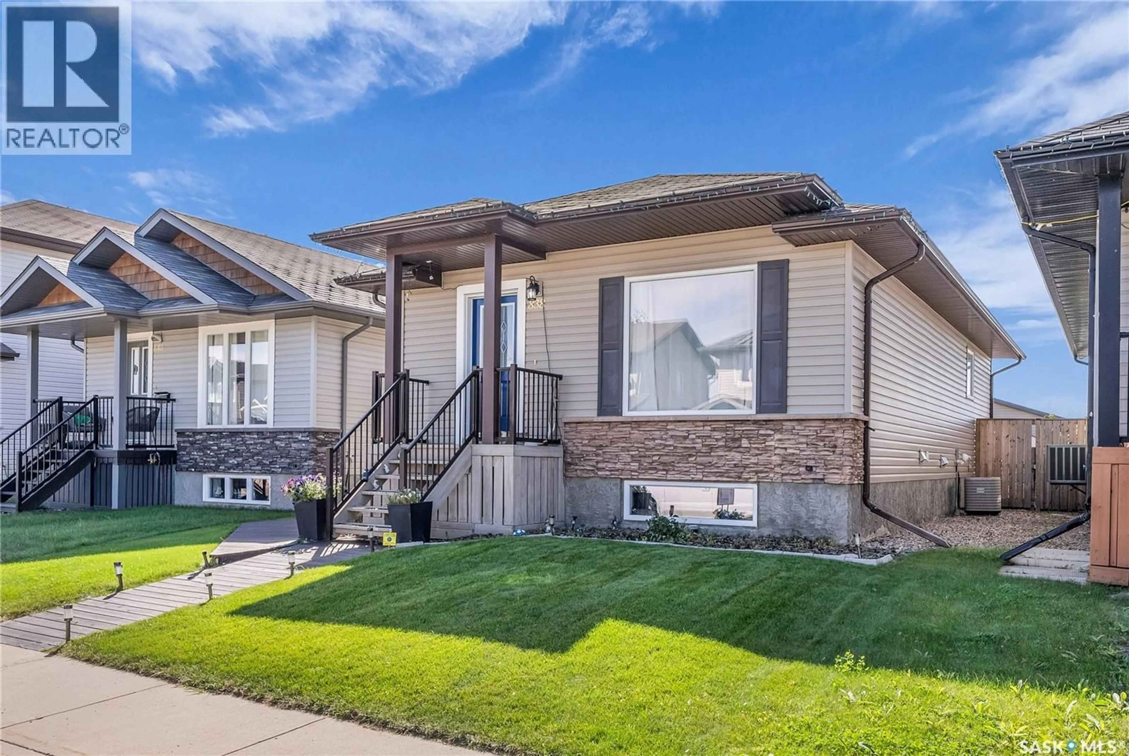 Home with vinyl exterior material, street for 838 GLENVIEW COVE, Martensville Saskatchewan S0K0A2