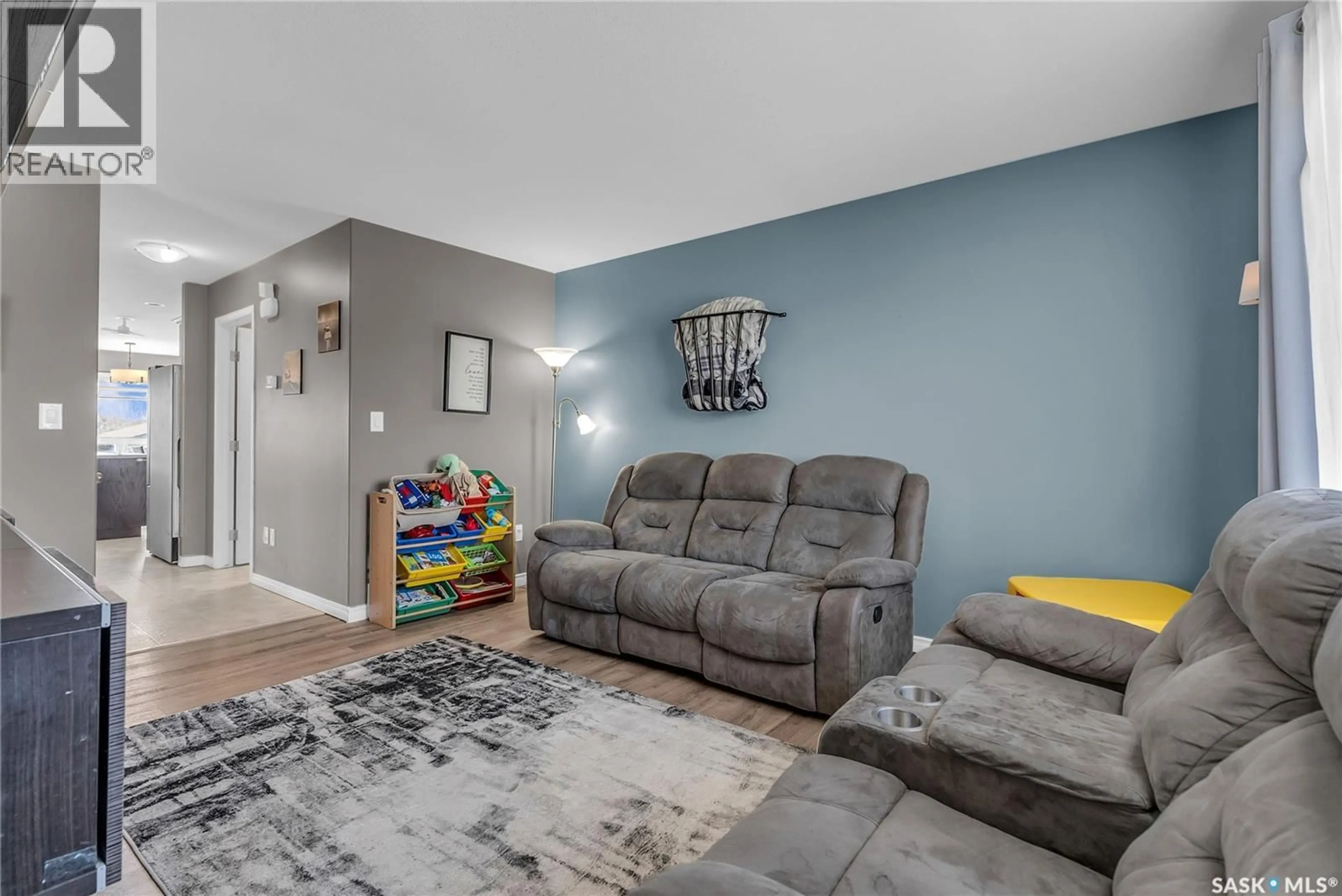 Living room with furniture, unknown for 838 GLENVIEW COVE, Martensville Saskatchewan S0K0A2