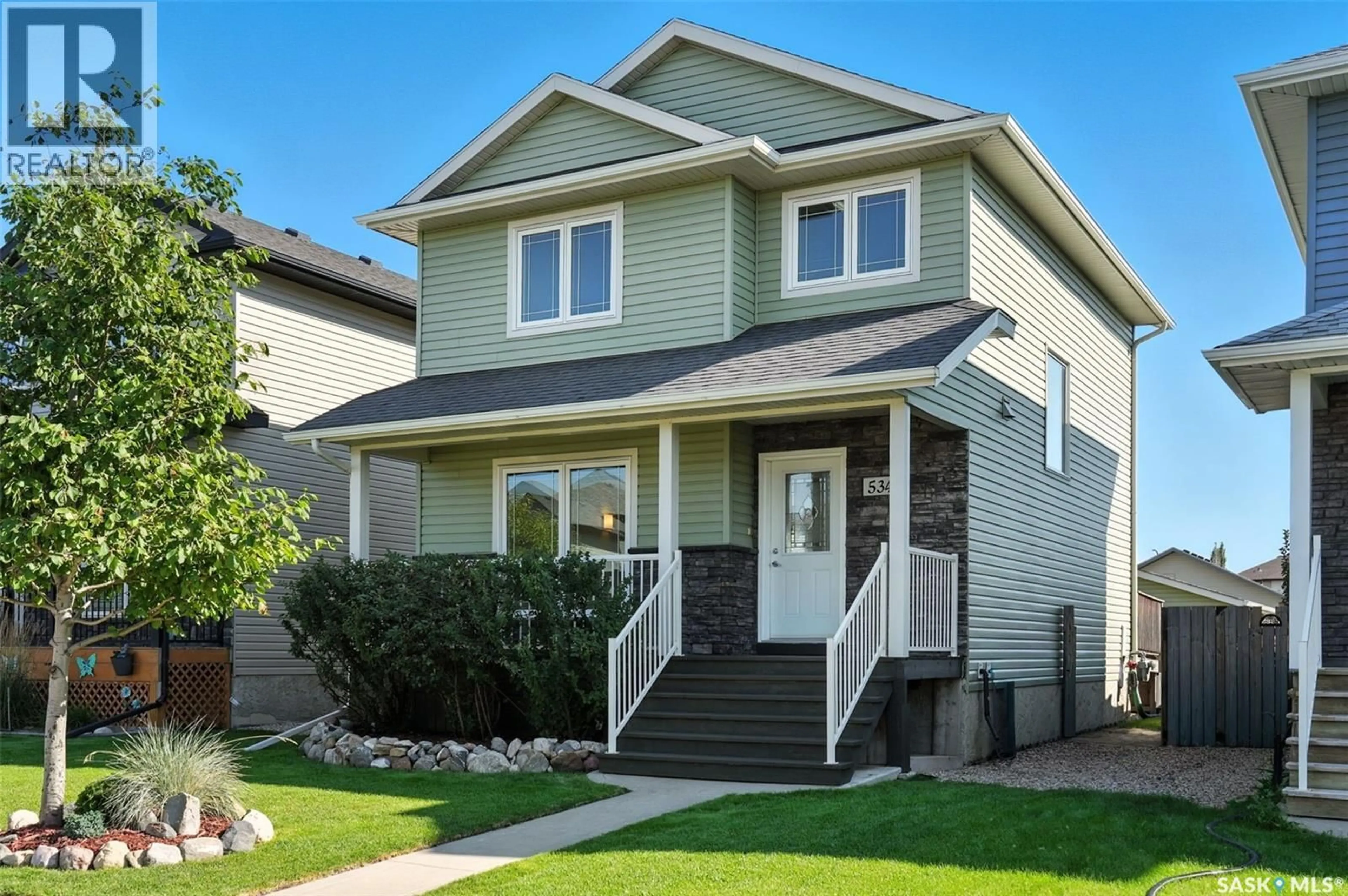 Home with vinyl exterior material, street for 534 KLASSEN CRESCENT, Saskatoon Saskatchewan S7R0G2