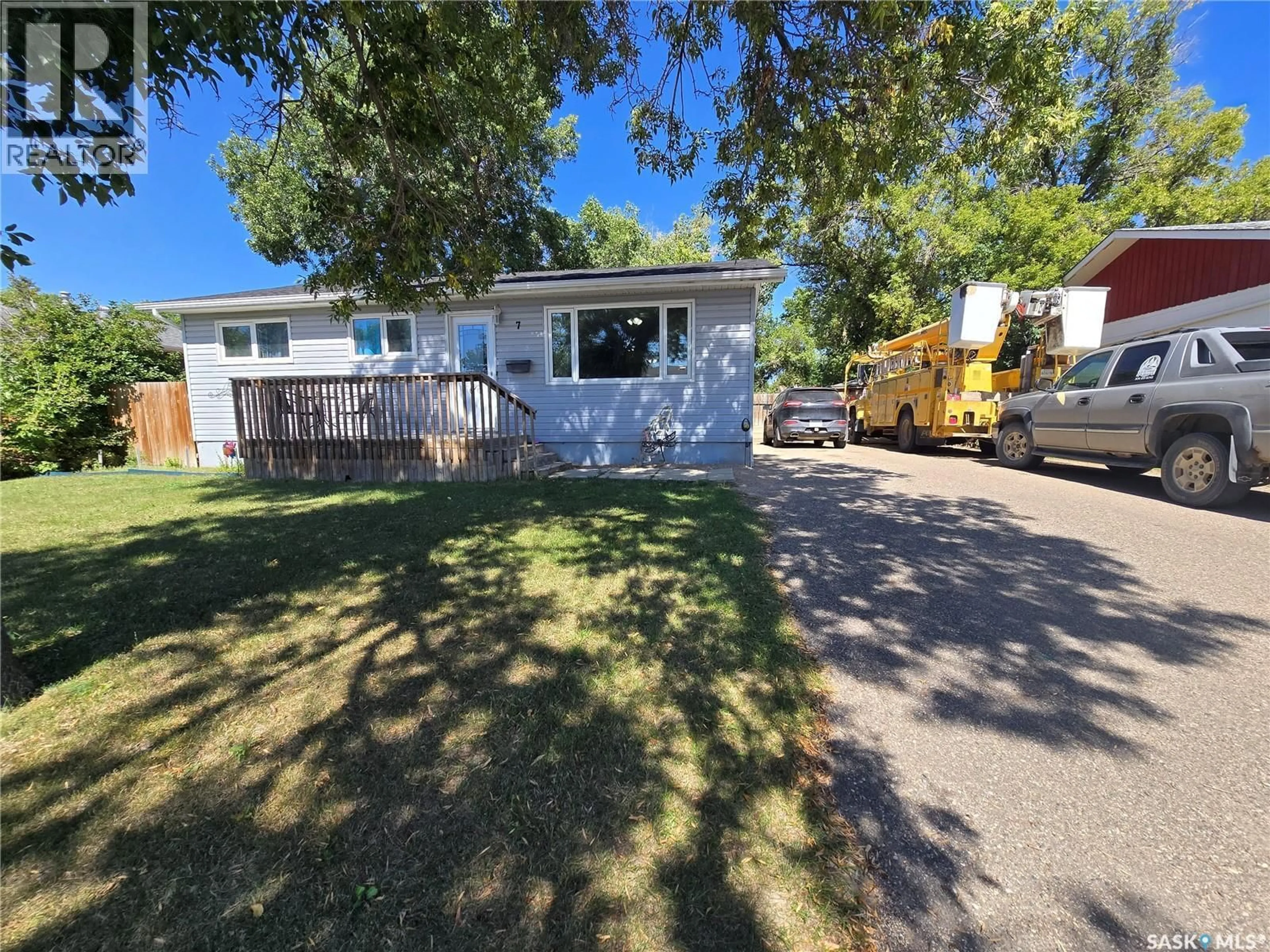 Home with vinyl exterior material, street for 7 MITCHELL CRESCENT, Weyburn Saskatchewan S4H2M3
