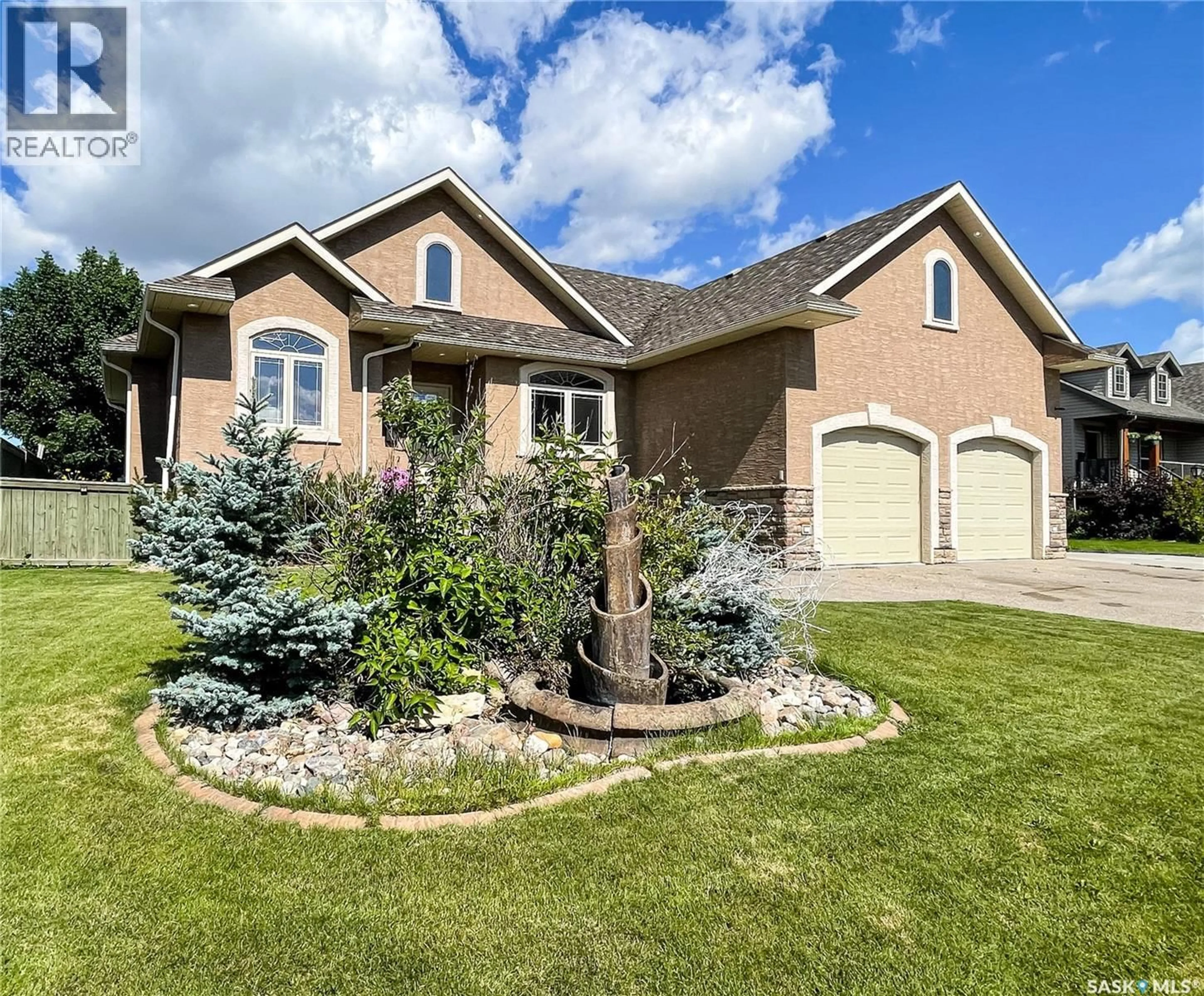 Home with brick exterior material, street for 33 BRIDGER DRIVE, Meadow Lake Saskatchewan S9X1Z9