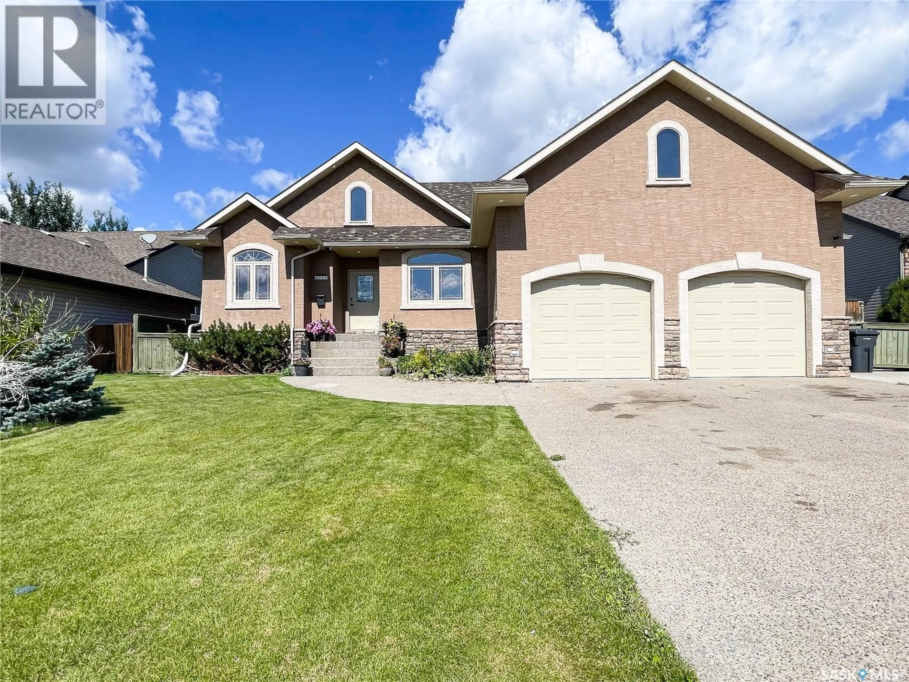 Home with brick exterior material, street for 33 BRIDGER DRIVE, Meadow Lake Saskatchewan S9X1Z9