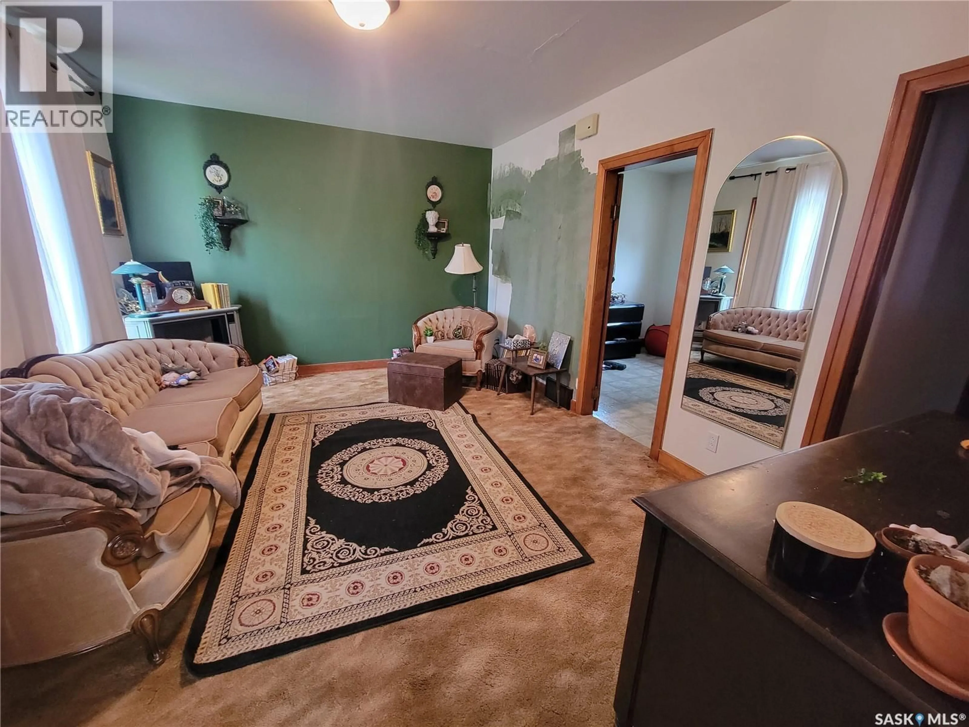 Living room with furniture, carpet floor for 204 PRINCESS AVENUE, Hafford Saskatchewan S0J1A0