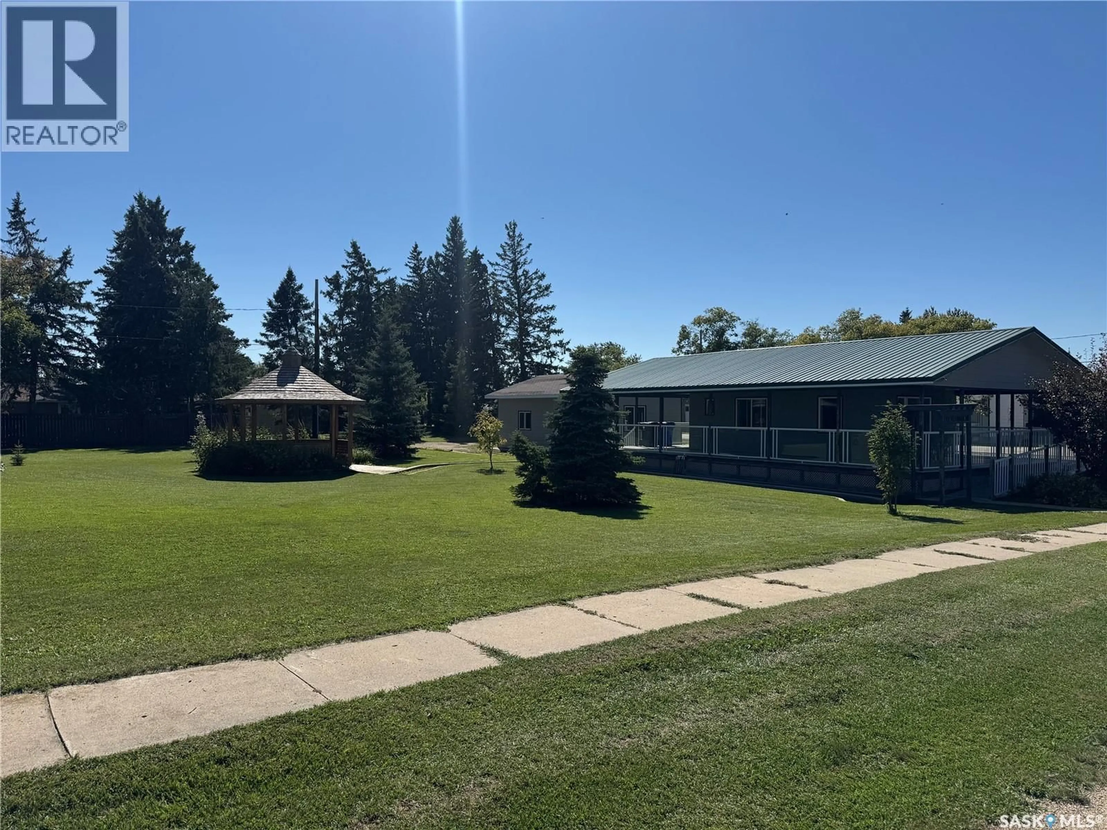 A pic from outside/outdoor area/front of a property/back of a property/a pic from drone, unknown for 217 RAILWAY AVENUE, Hafford Saskatchewan S0J1A0