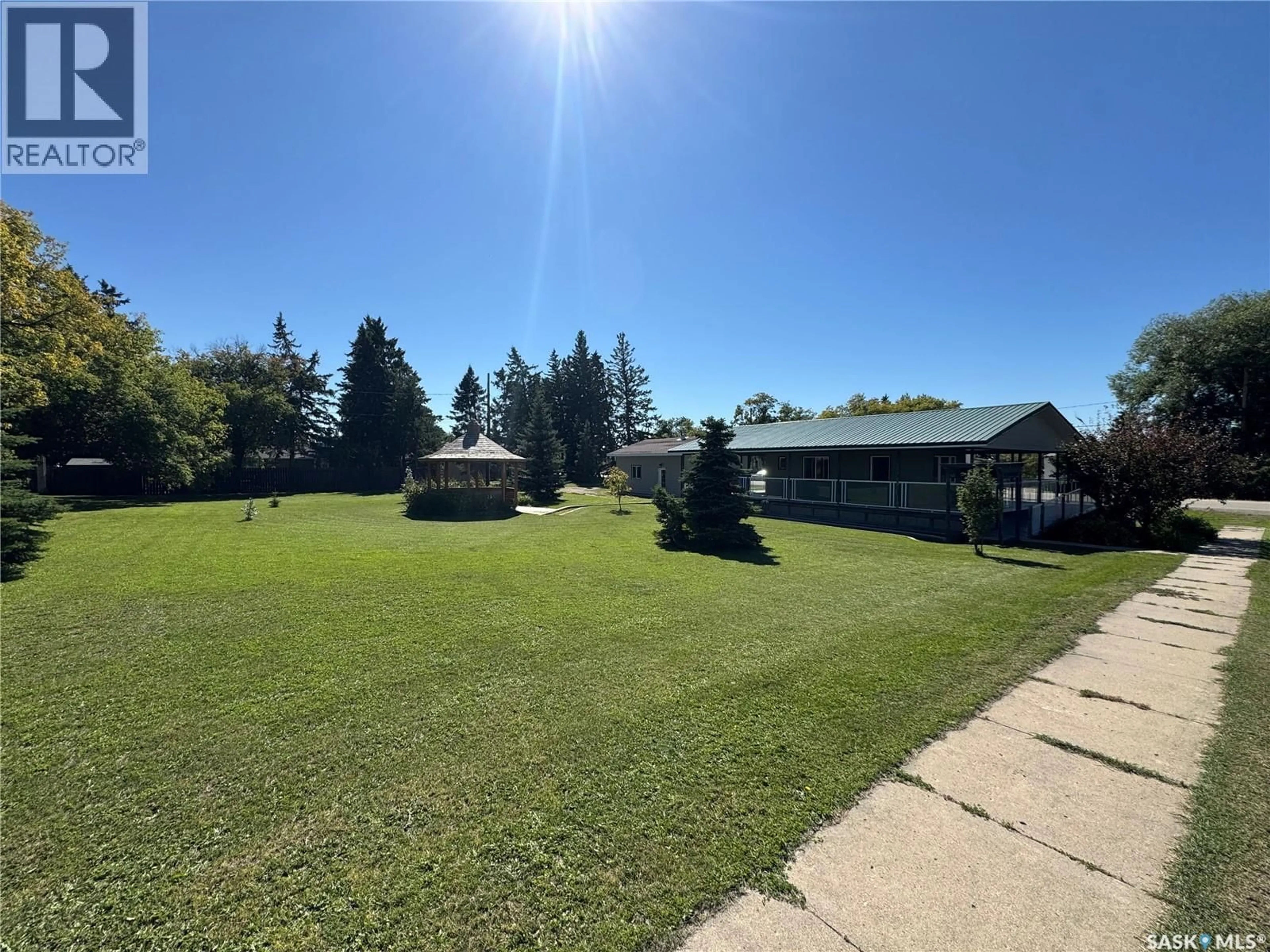 A pic from outside/outdoor area/front of a property/back of a property/a pic from drone, unknown for 217 RAILWAY AVENUE, Hafford Saskatchewan S0J1A0