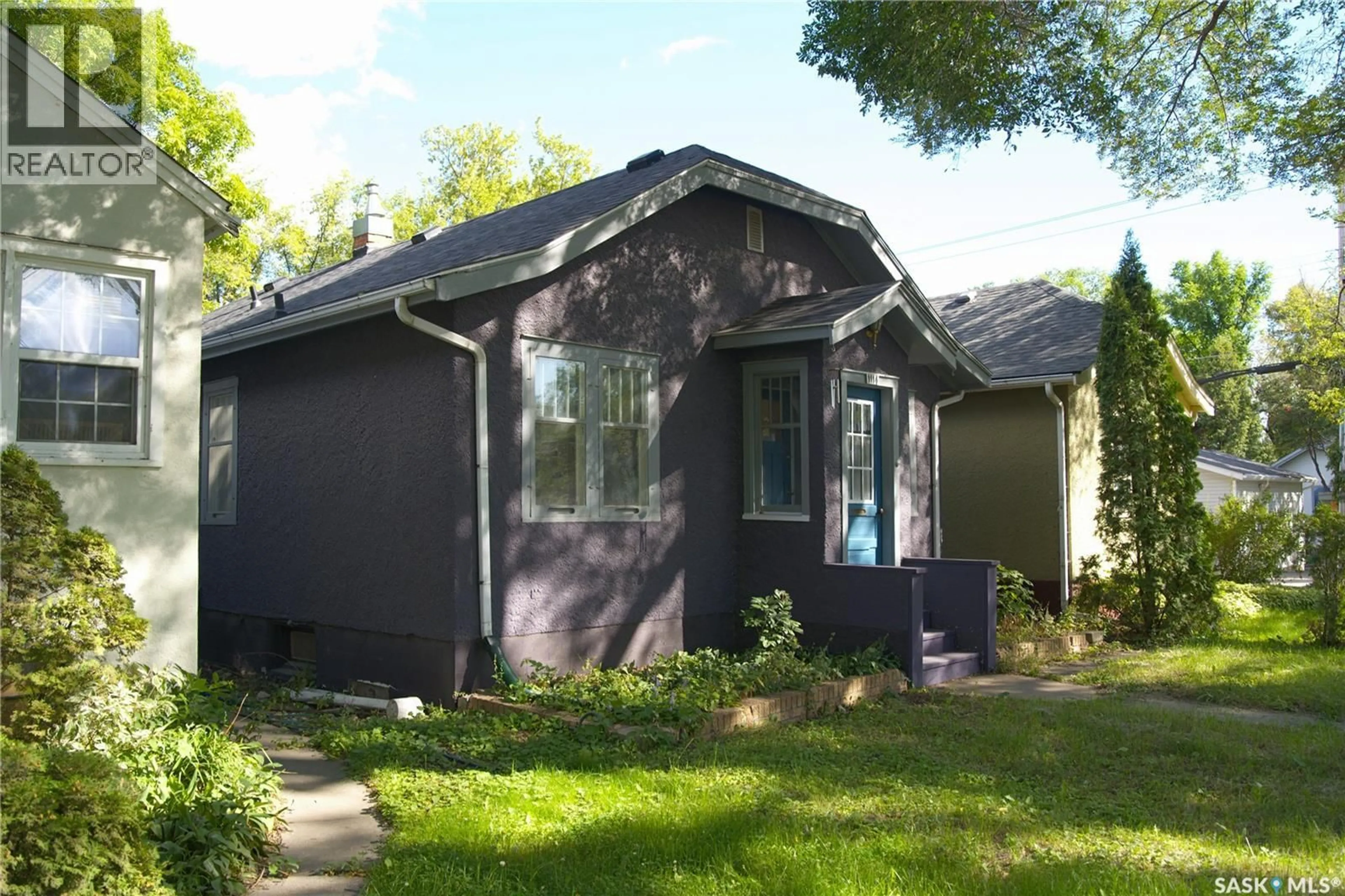 Home with vinyl exterior material, street for 1114 C AVENUE, Saskatoon Saskatchewan S7L1K4