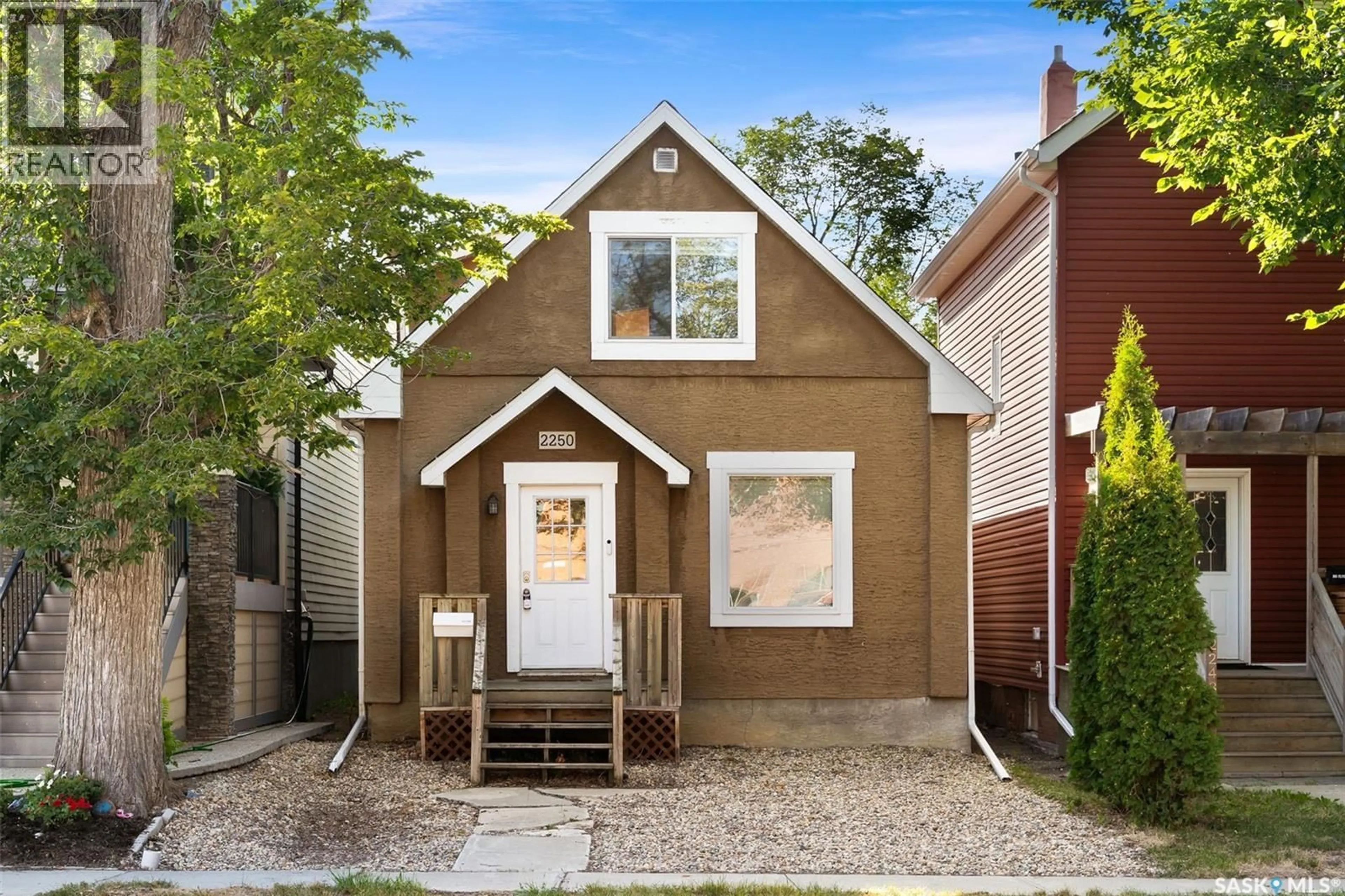 Home with brick exterior material, street for 2250 HALIFAX STREET, Regina Saskatchewan S4P1V2
