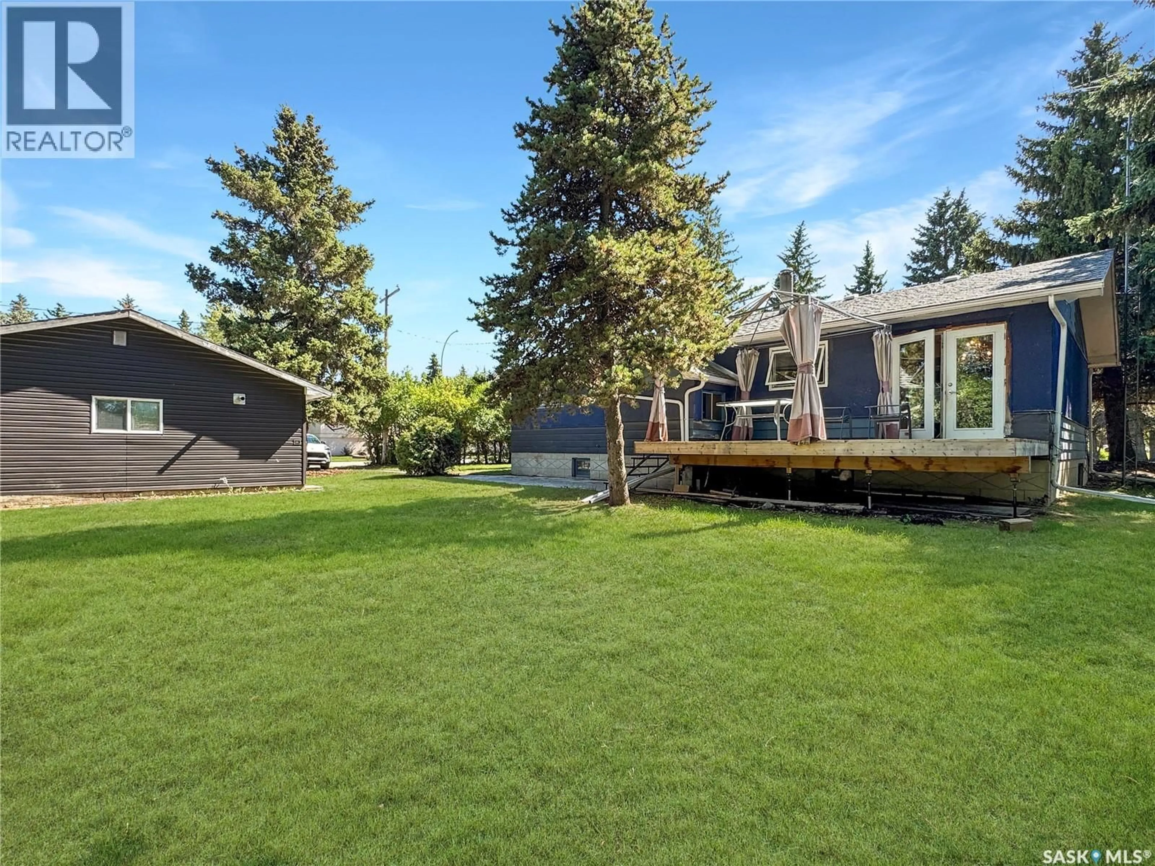 A pic from outside/outdoor area/front of a property/back of a property/a pic from drone, mountain view for 111 DION AVENUE, Cut Knife Saskatchewan S0M0N0
