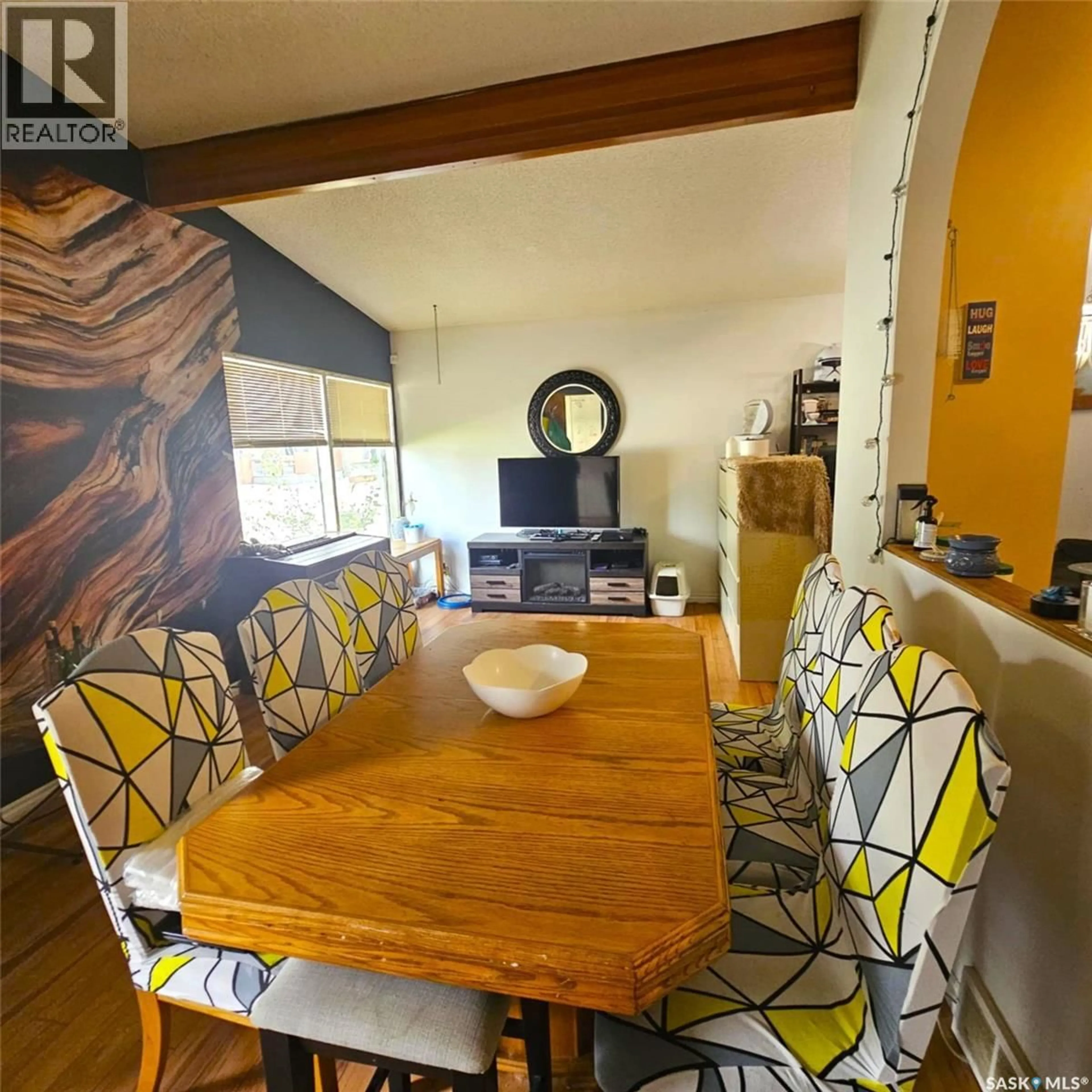 Dining room, wood/laminate floor for 102 CAREY STREET, Regina Saskatchewan S4R4G9