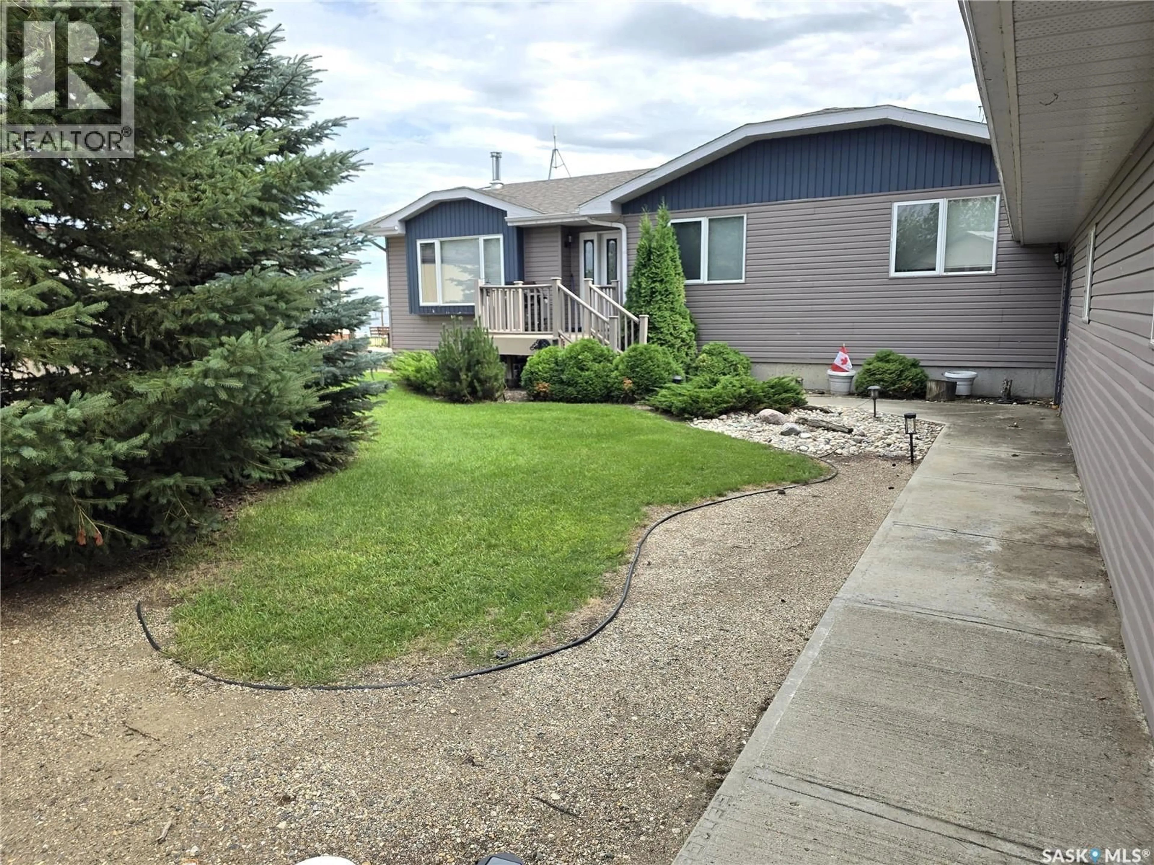 A pic from outside/outdoor area/front of a property/back of a property/a pic from drone, unknown for 218 RUBY DRIVE, Coteau Rm No. 255 Saskatchewan S0L0G0