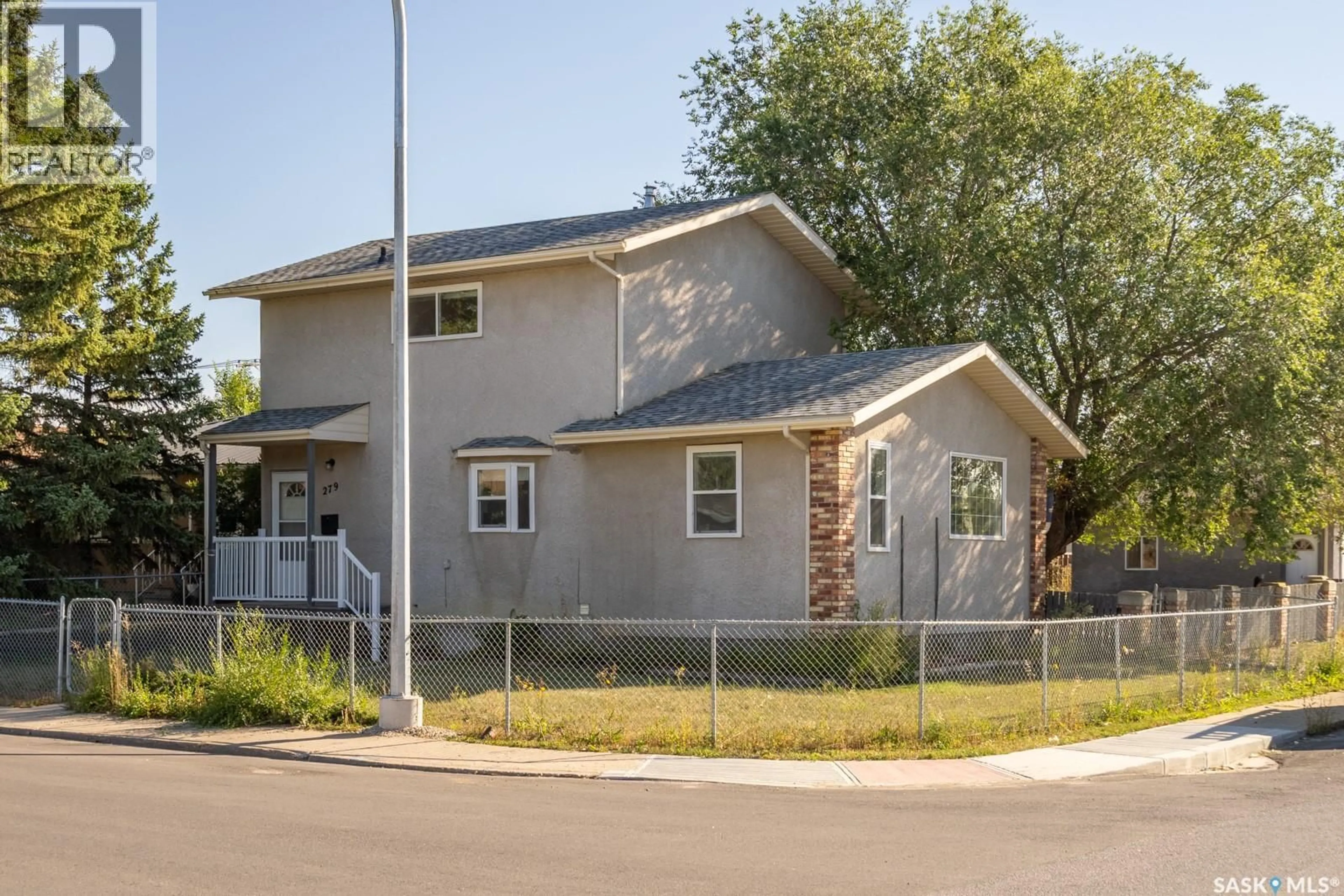 Home with vinyl exterior material, street for 279 ANGUS STREET, Regina Saskatchewan S4R3H4
