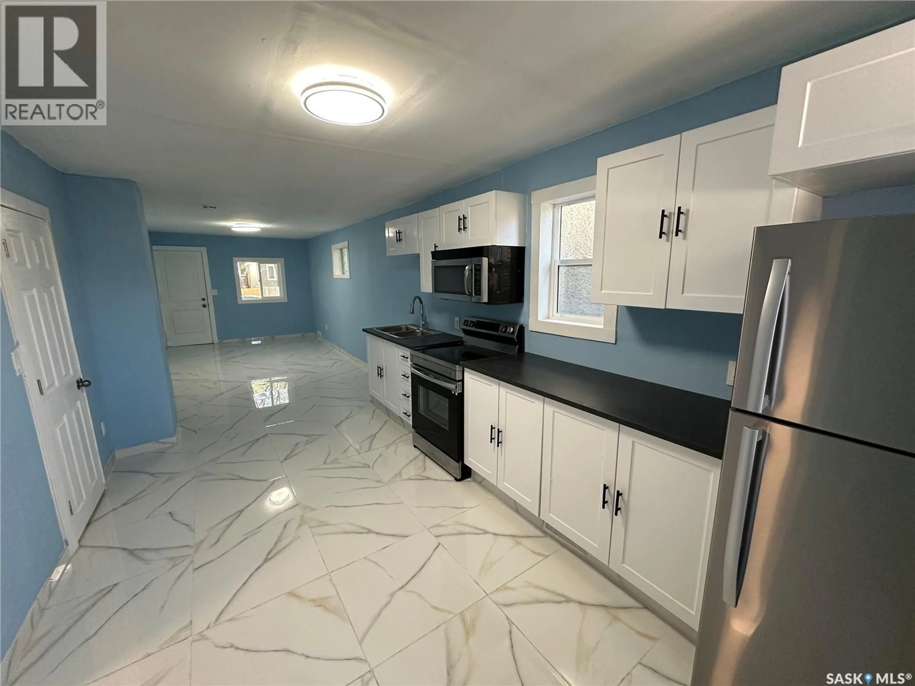 Open concept kitchen, ceramic/tile floor for 1760 QUEBEC STREET, Regina Saskatchewan S4P1J3