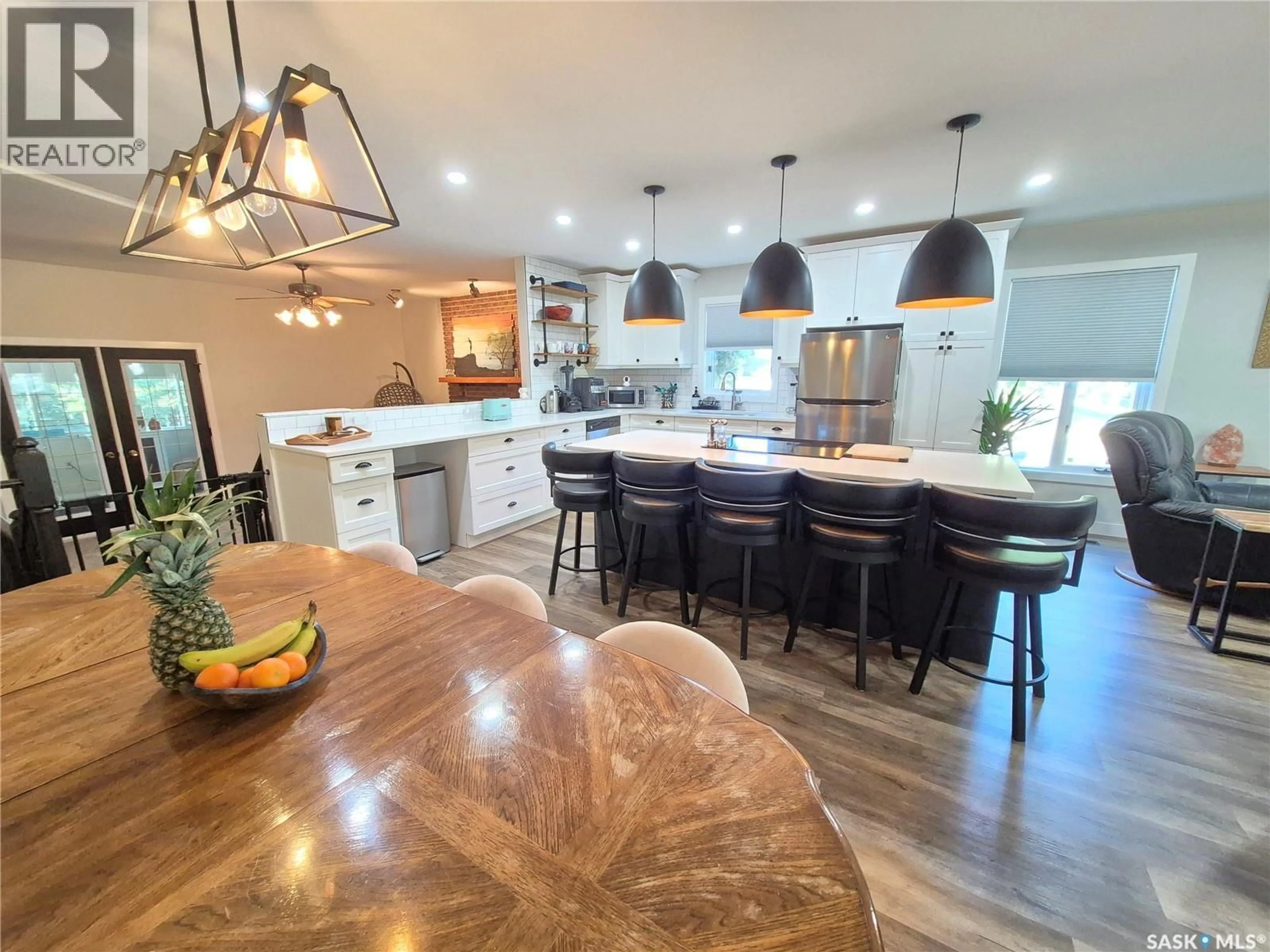 Open concept kitchen, wood/laminate floor for 502 HUNT STREET, Radville Saskatchewan S0C2G0