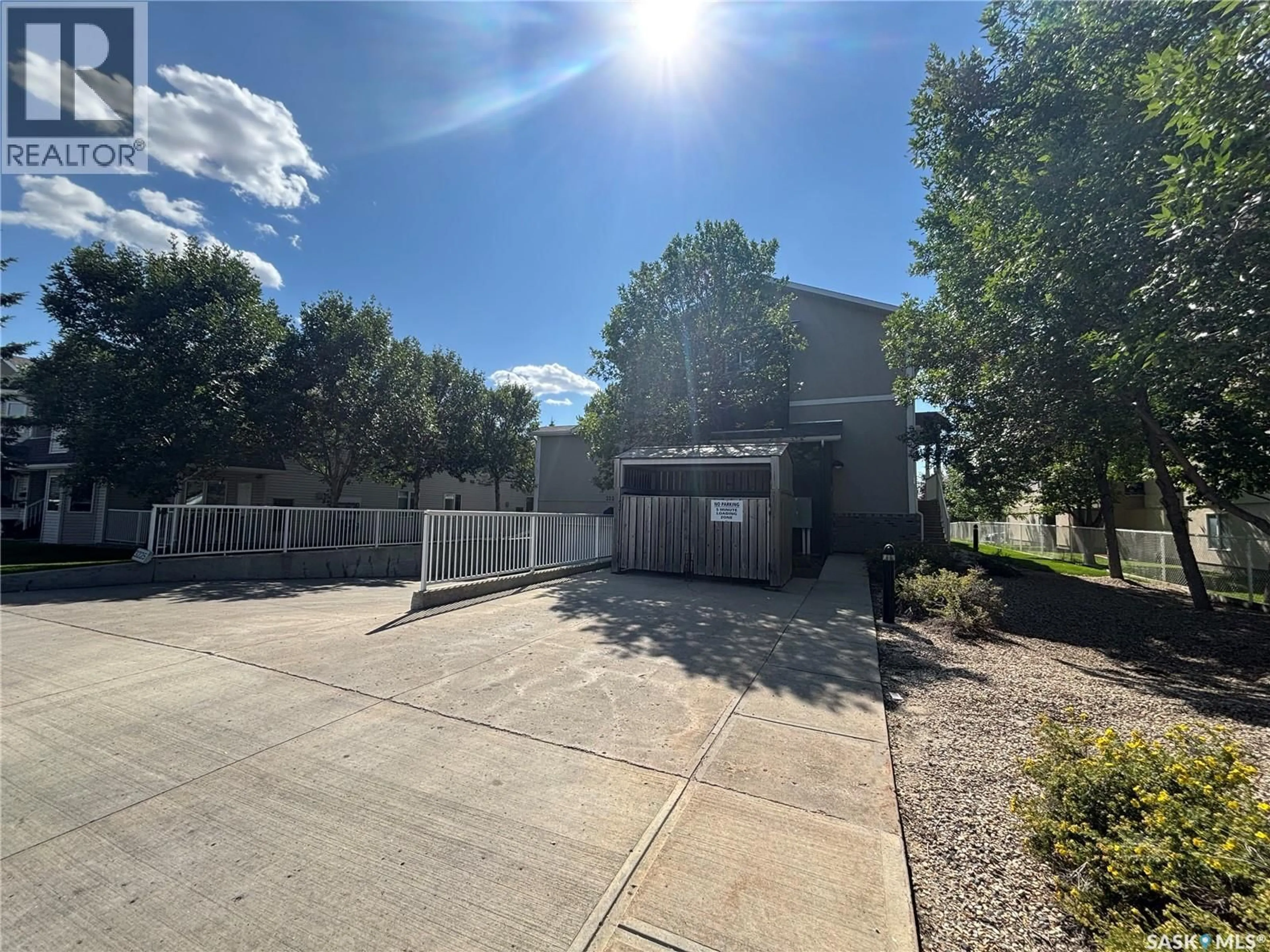 A pic from outside/outdoor area/front of a property/back of a property/a pic from drone, building for 3 - 3225 WOODHAMS DRIVE, Regina Saskatchewan S4V3A2