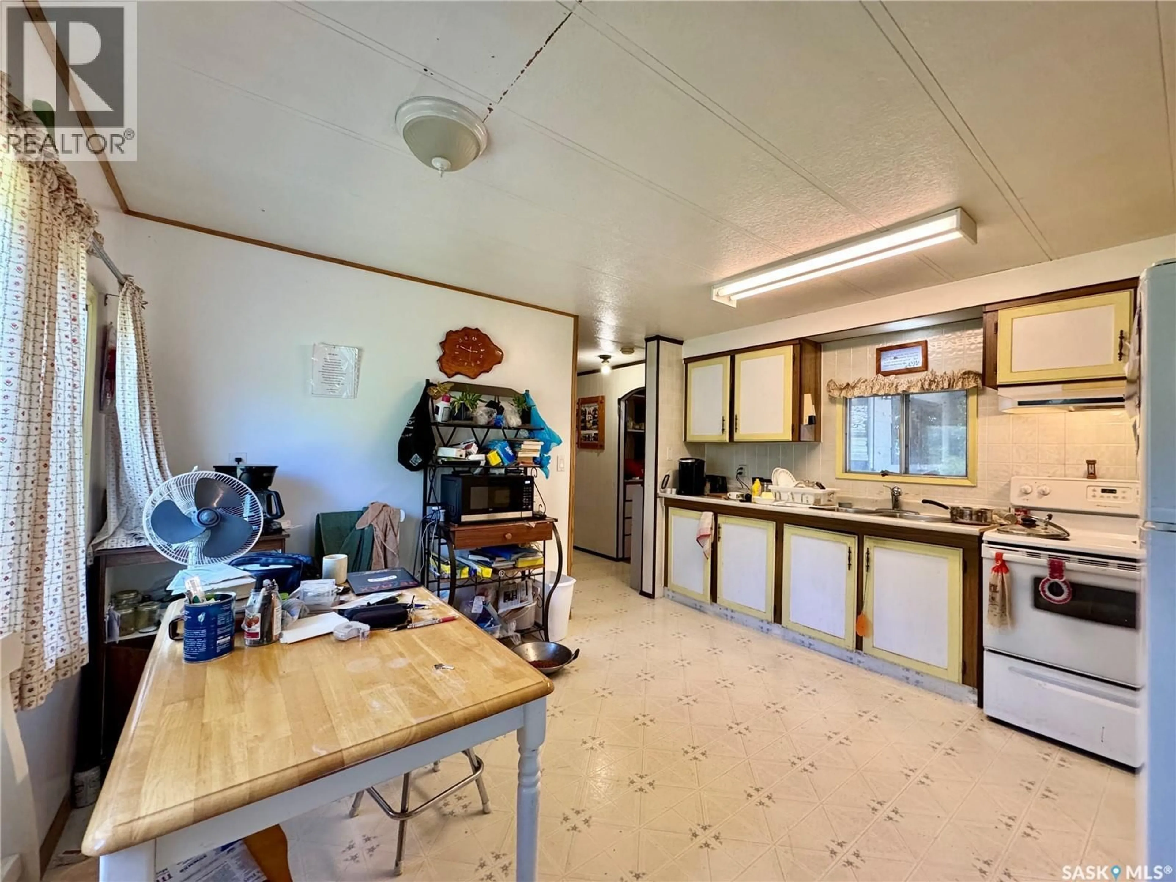 Kitchen with laundary machines, unknown for 205 MAIN STREET, Gerald Saskatchewan S0A0X0