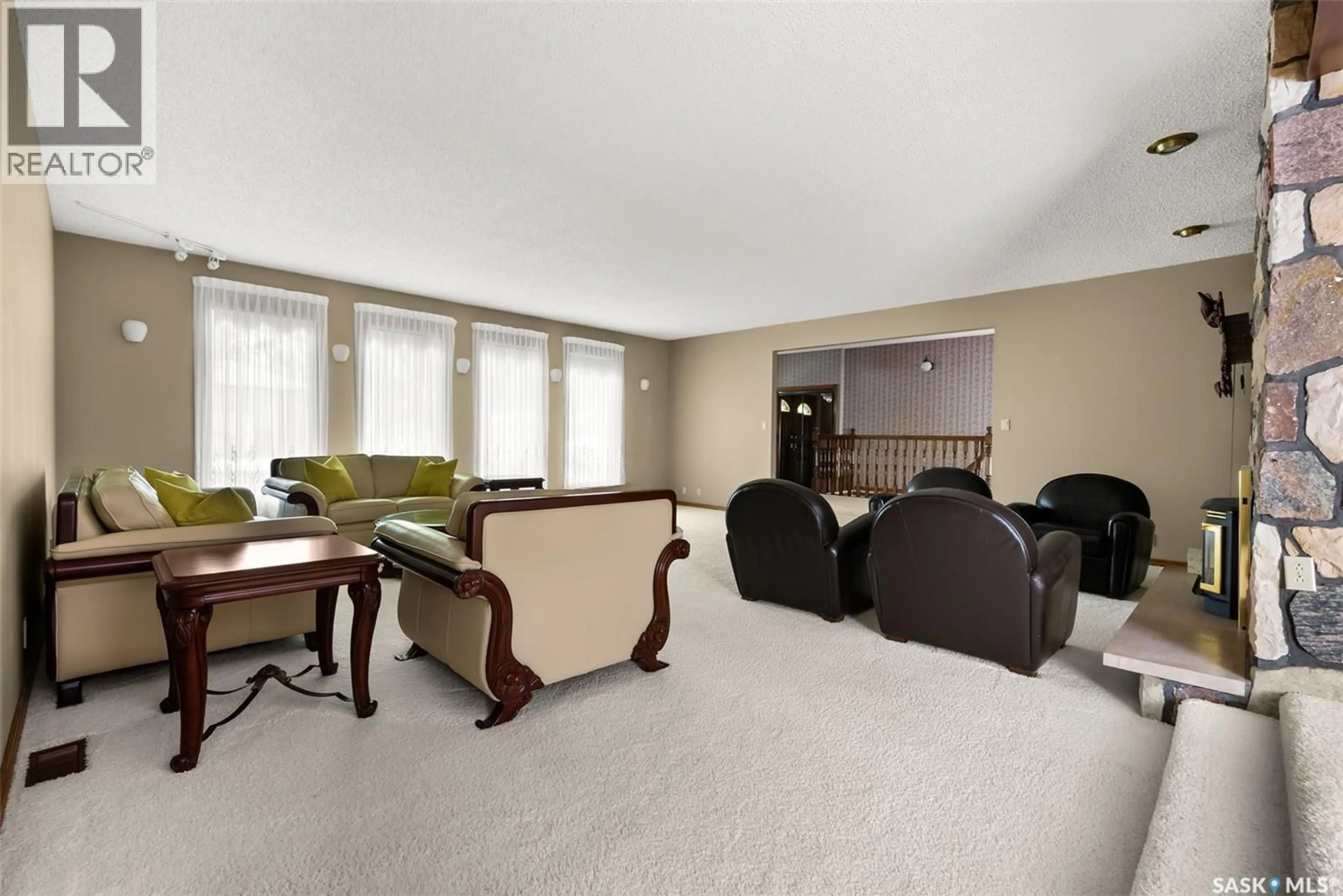Living room with furniture, carpet floor for 251 HALIFAX STREET, Regina Saskatchewan S4R2W6