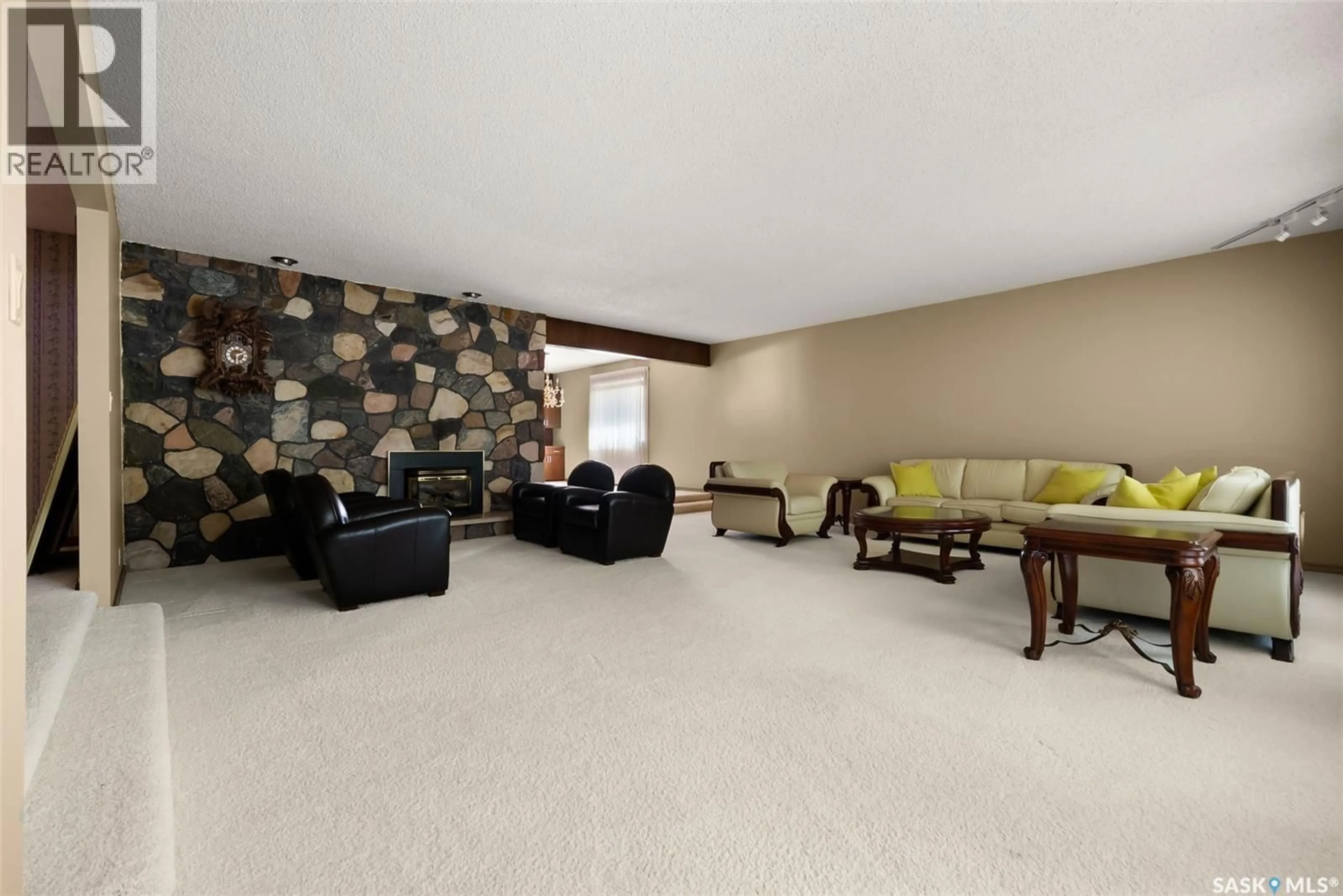 Living room with furniture, carpet floor for 251 HALIFAX STREET, Regina Saskatchewan S4R2W6