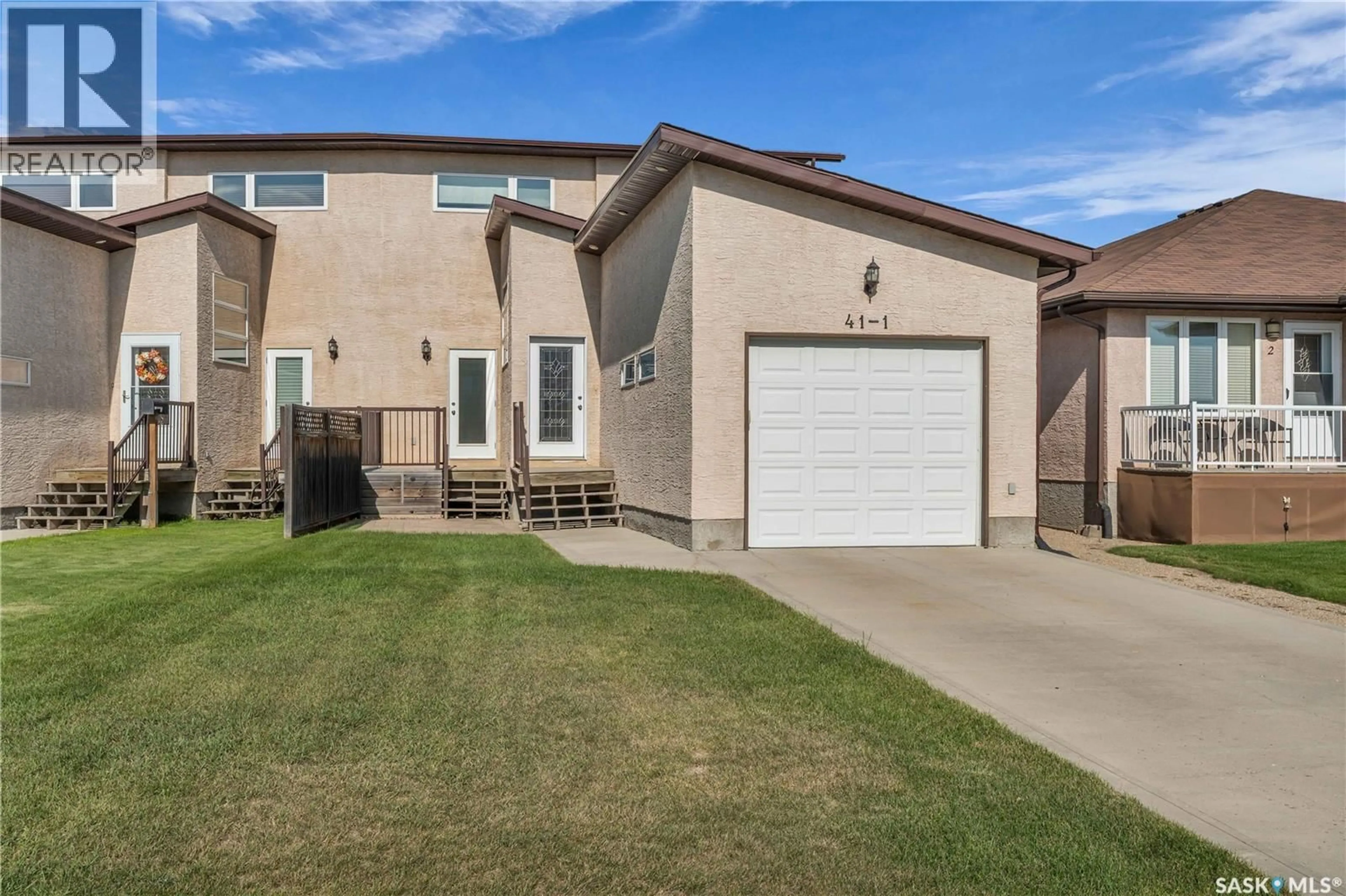 Home with vinyl exterior material, street for 1 41 QU'APPELLE CRESCENT, Balgonie Saskatchewan S0G0E0