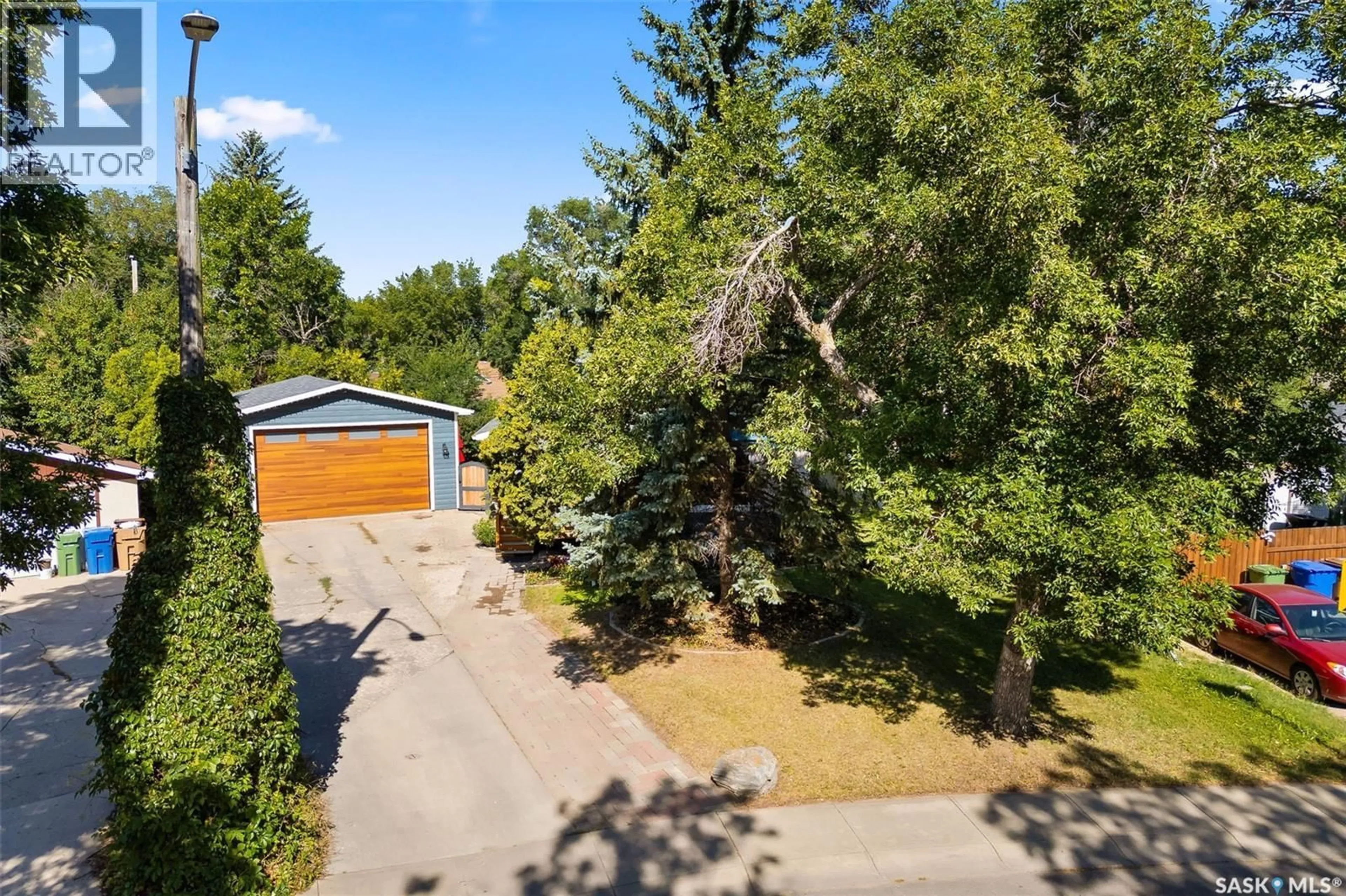 A pic from outside/outdoor area/front of a property/back of a property/a pic from drone, forest/trees view for 116 SHANNON ROAD, Regina Saskatchewan S4S5B1