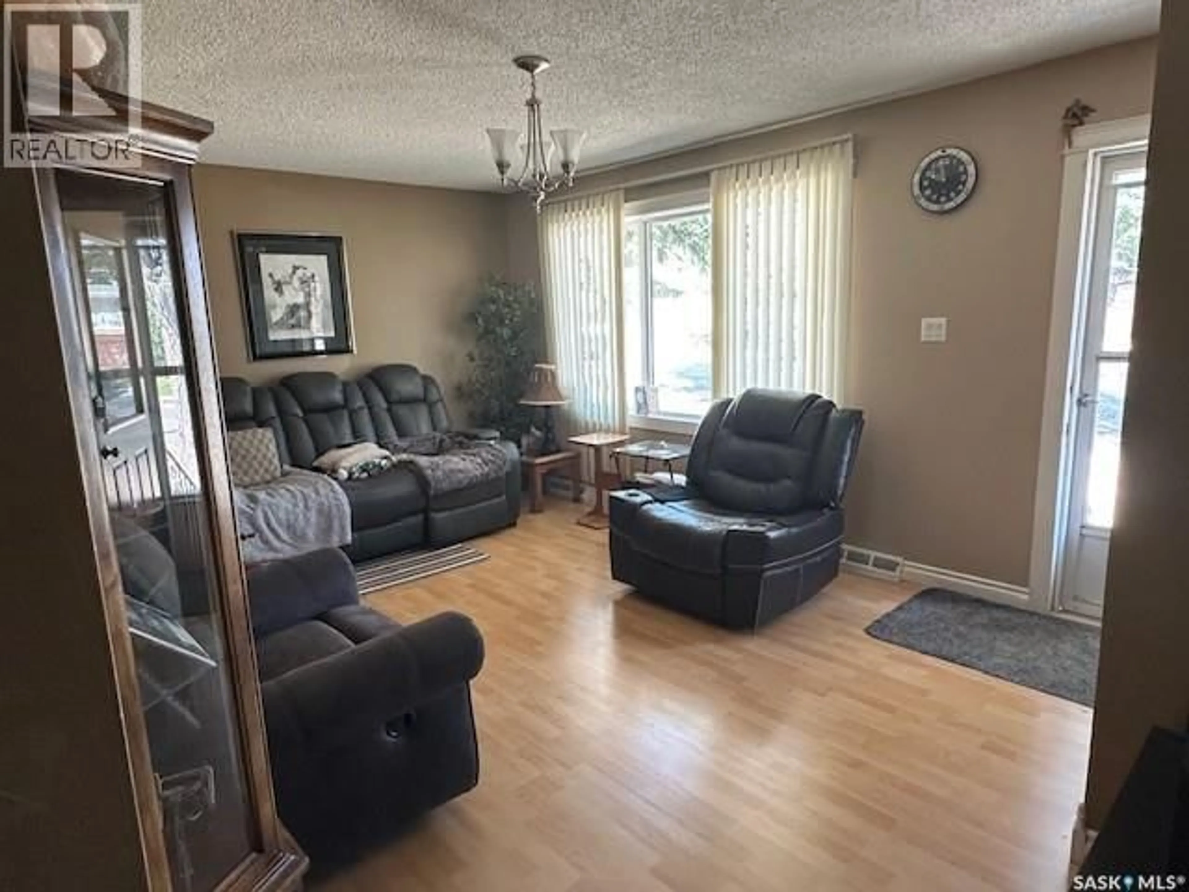 Living room with furniture, unknown for 1121 MONTGOMERY STREET, Moose Jaw Saskatchewan S6H2X2