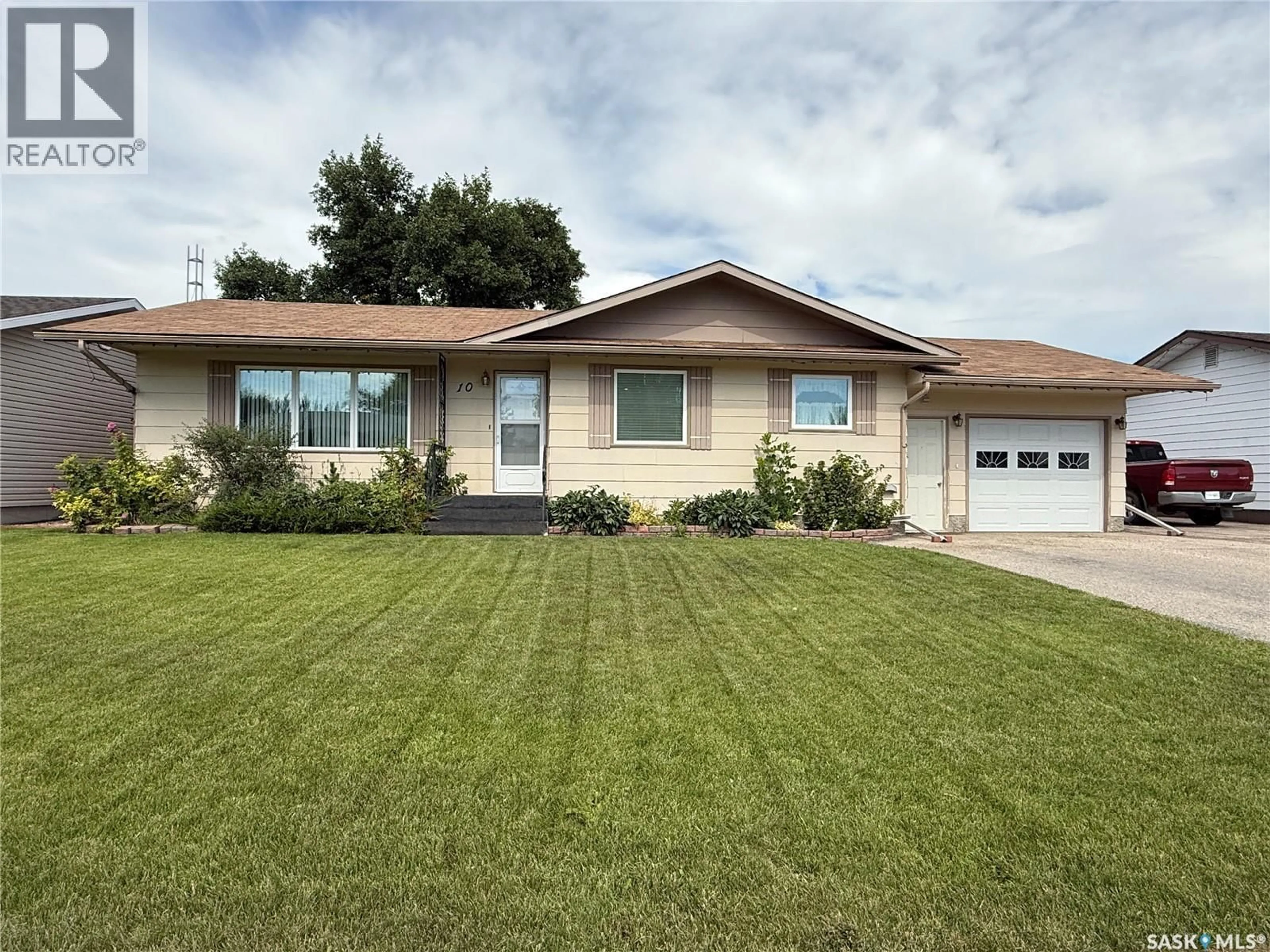 Home with vinyl exterior material, street for 10 JUBILEE DRIVE, Humboldt Saskatchewan S0K2A0
