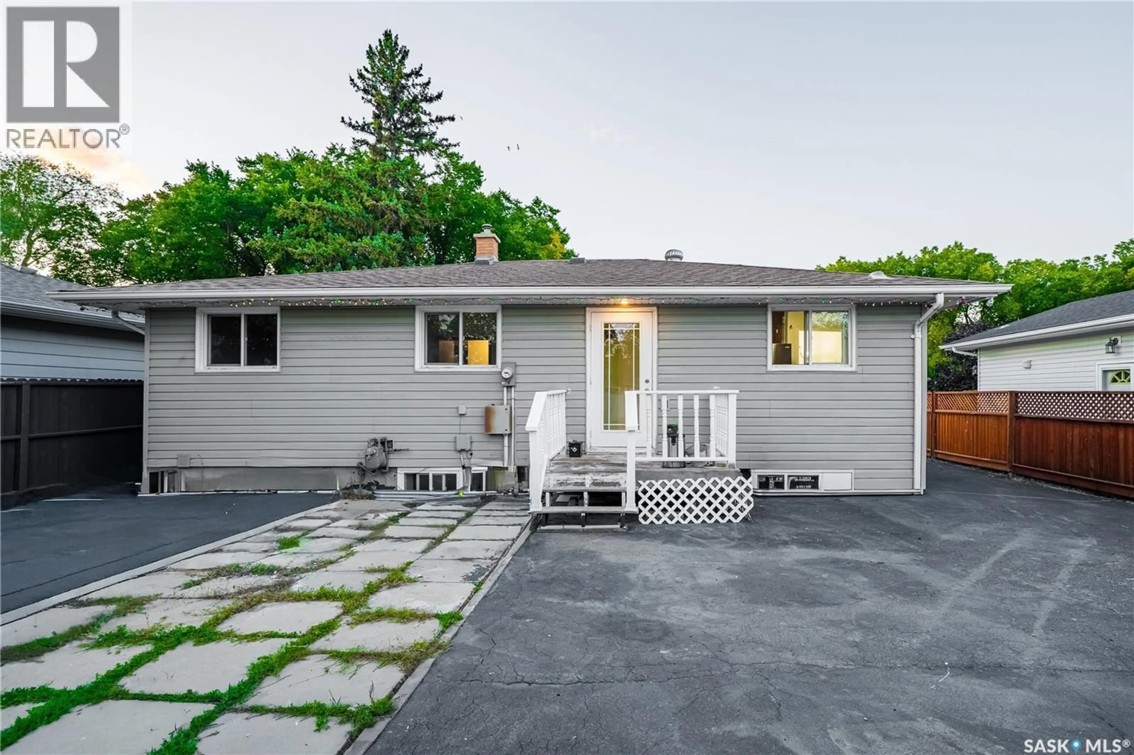 Home with vinyl exterior material, street for 87 MERLIN CRESCENT, Regina Saskatchewan S4R3E3
