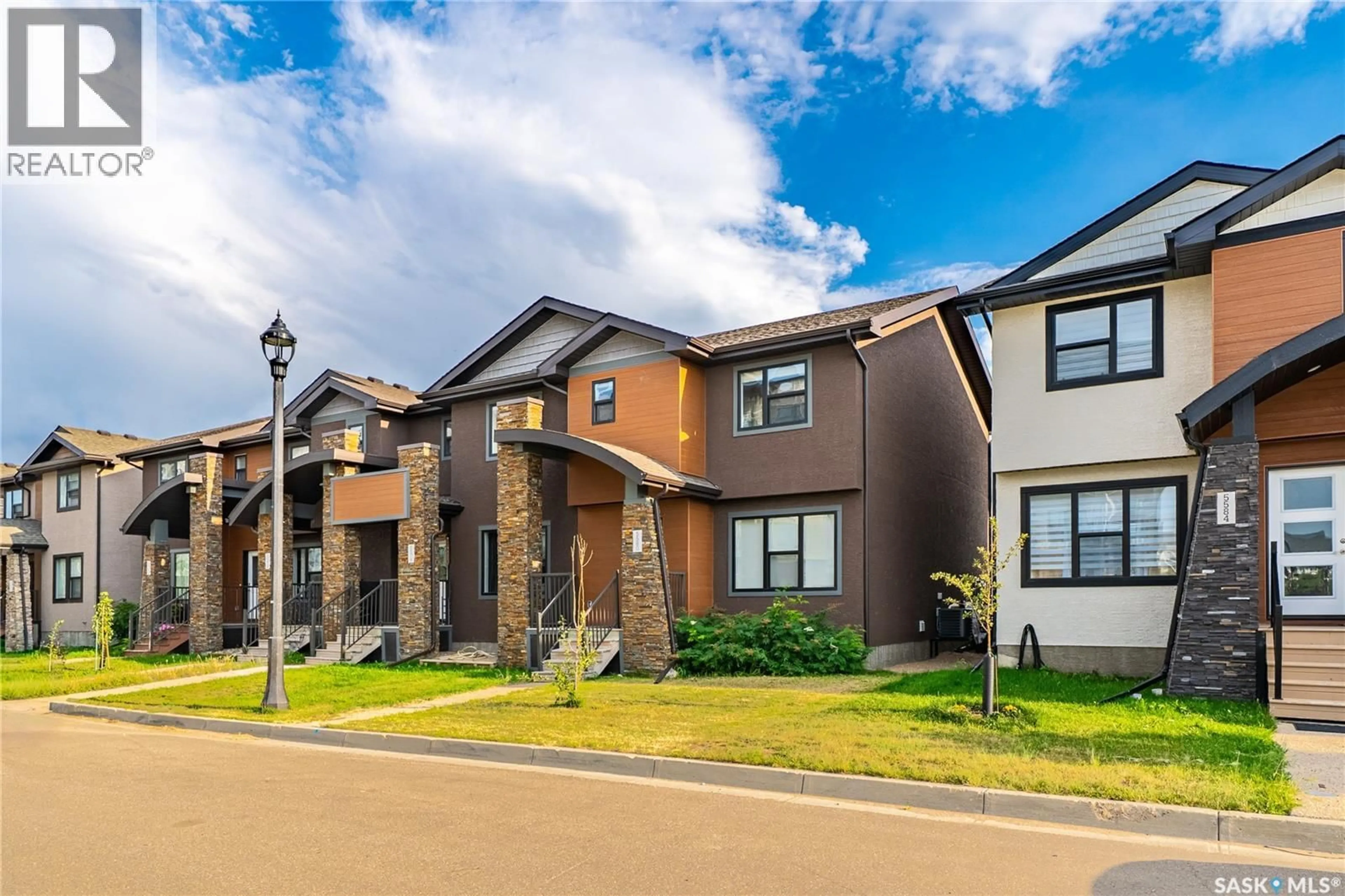 Home with brick exterior material, street for 5580 MCKENNA ROAD, Regina Saskatchewan S4W0N6
