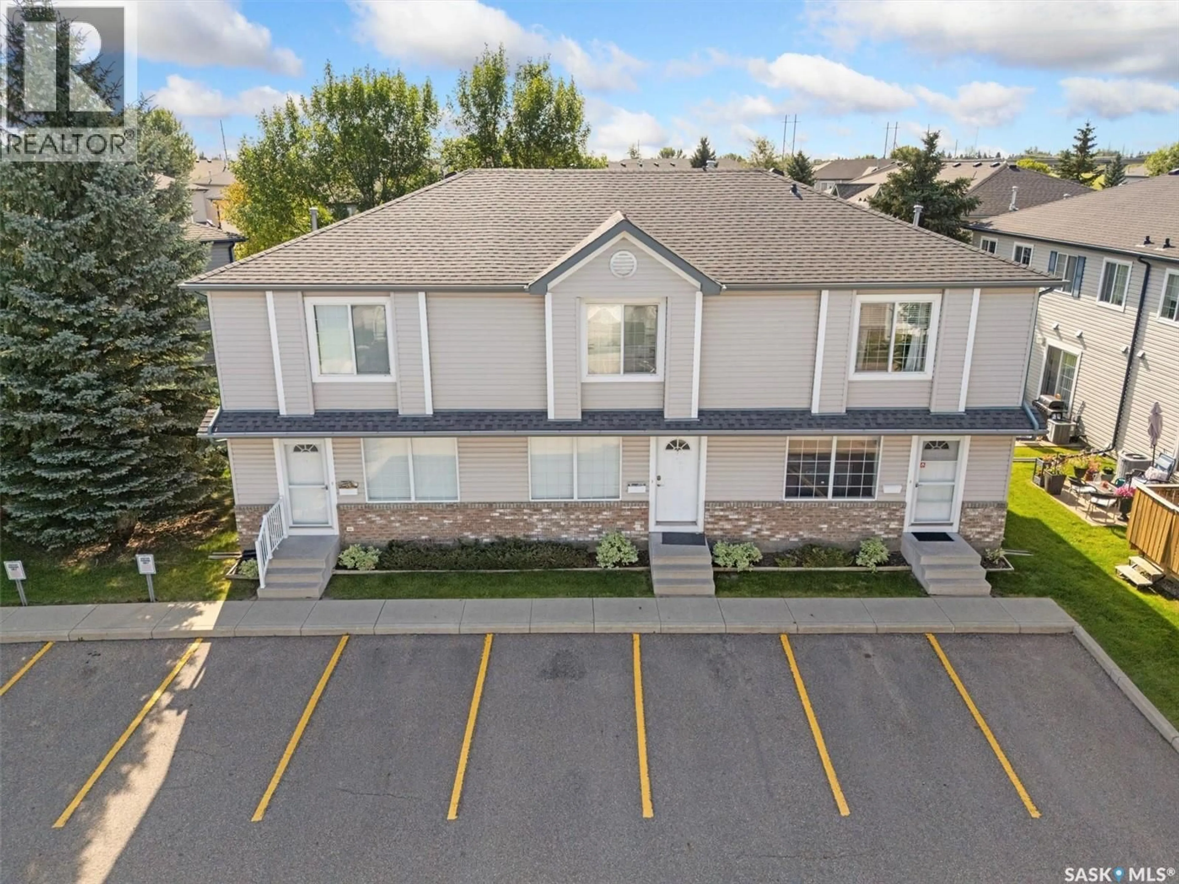 A pic from outside/outdoor area/front of a property/back of a property/a pic from drone, unknown for 229 663 BECKETT CRESCENT, Saskatoon Saskatchewan S7N4X1