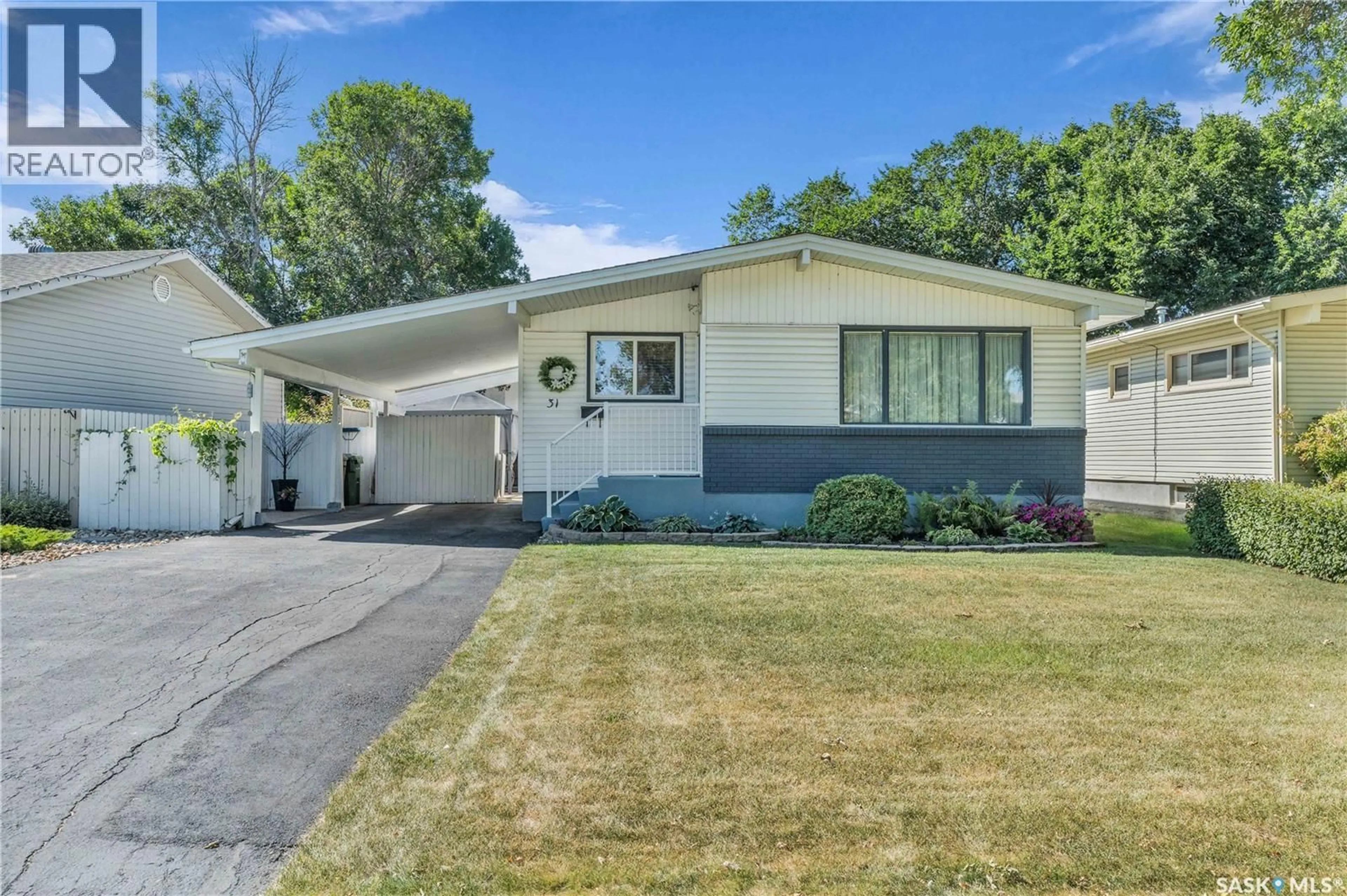Home with vinyl exterior material, street for 31 HAMMOND ROAD, Regina Saskatchewan S4R3C7