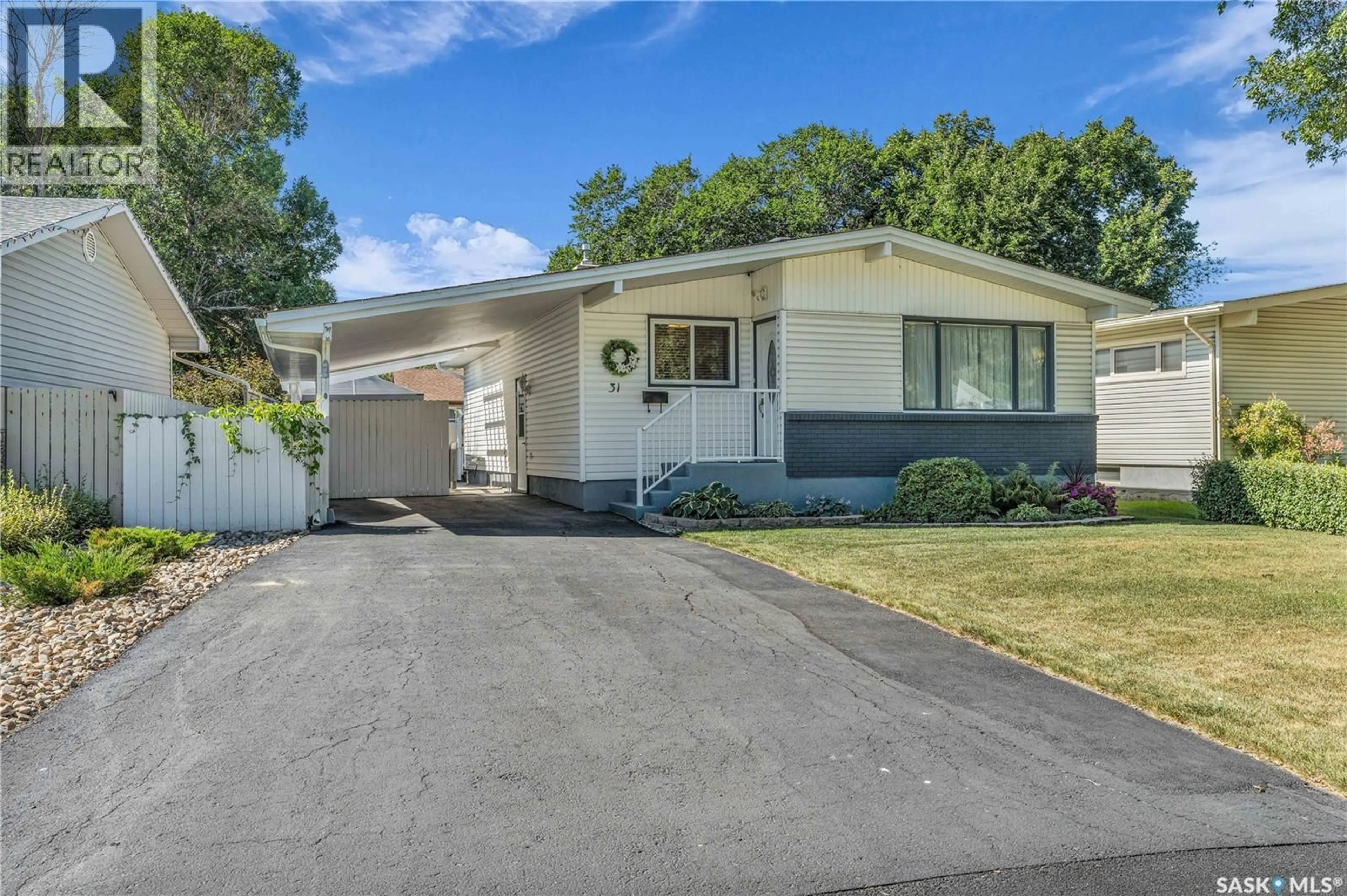 Home with vinyl exterior material, street for 31 HAMMOND ROAD, Regina Saskatchewan S4R3C7