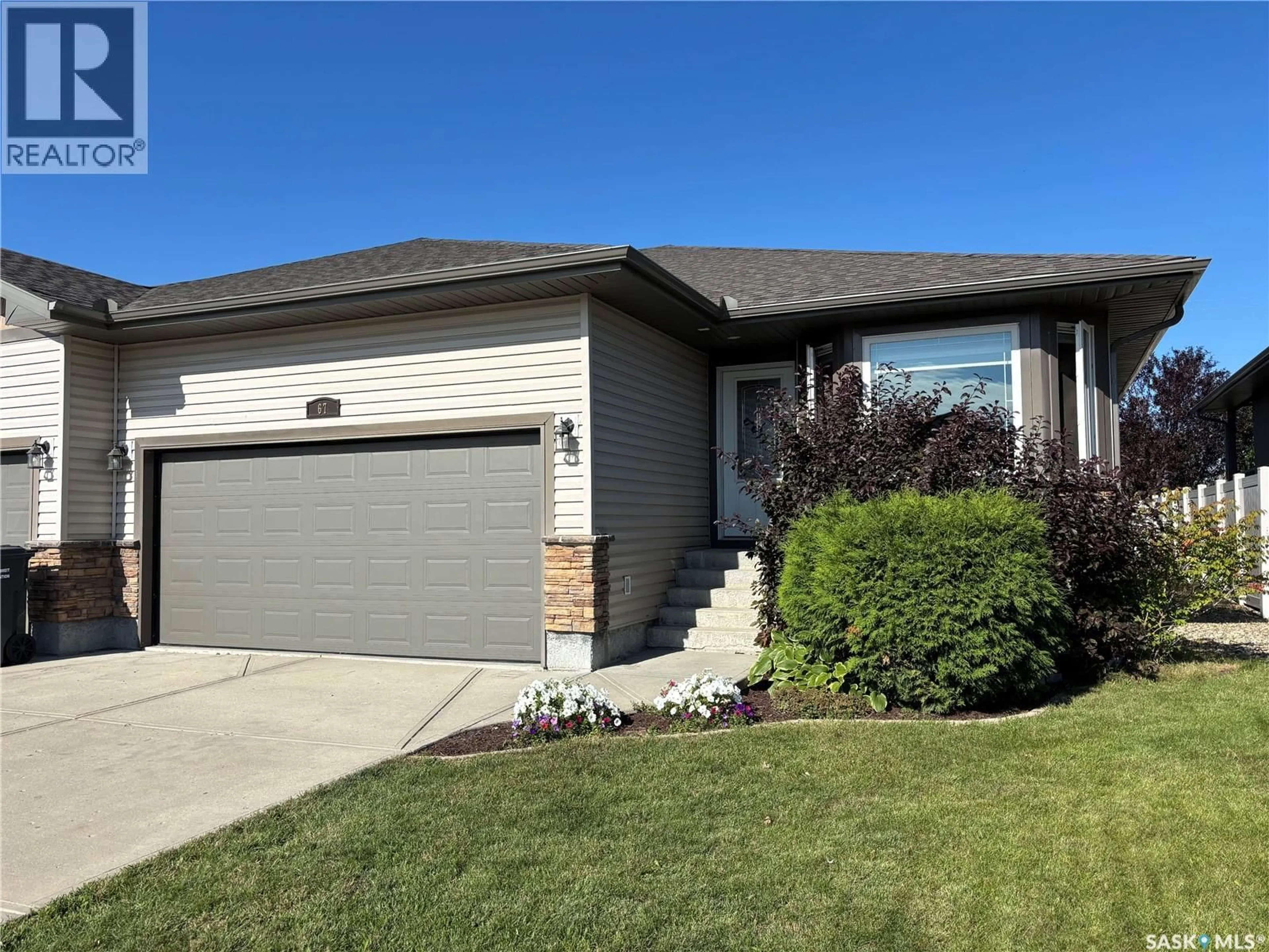 Home with vinyl exterior material, street for 67 GOOD SPIRIT CRESCENT, Yorkton Saskatchewan S3N0X1