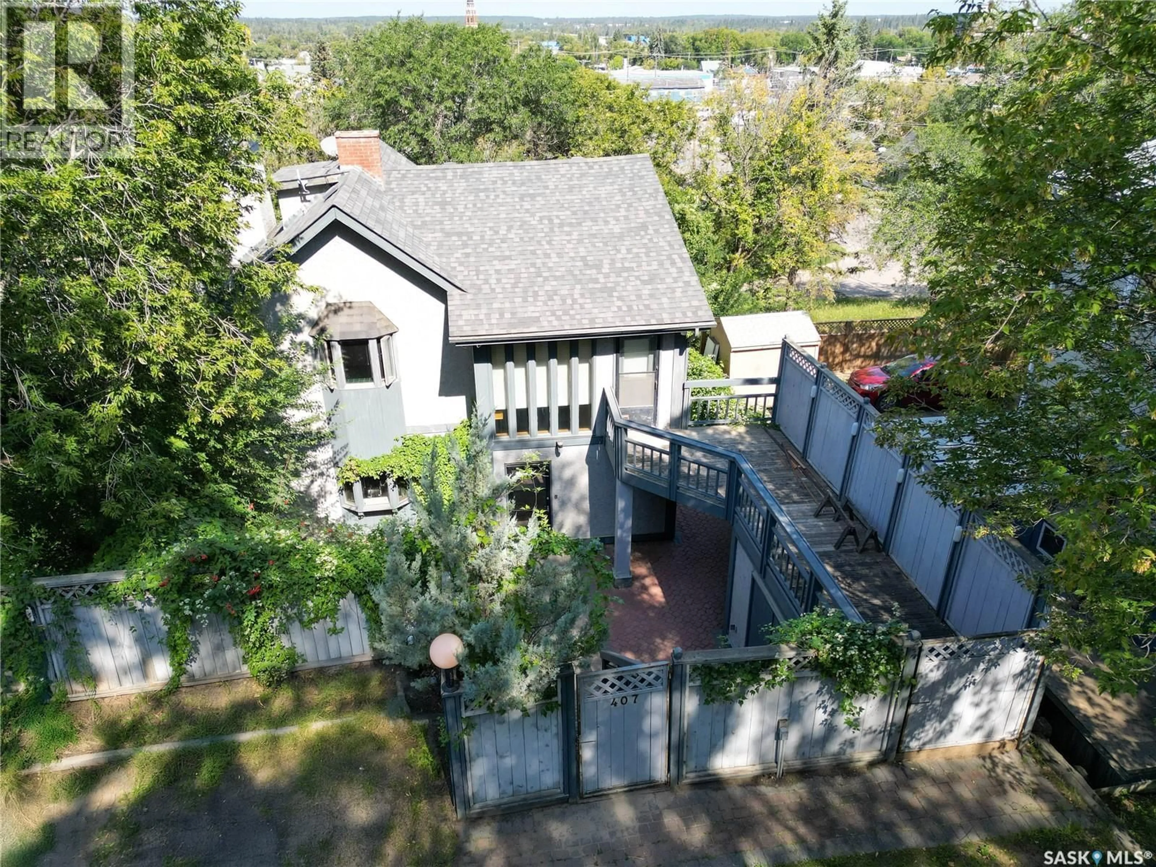 A pic from outside/outdoor area/front of a property/back of a property/a pic from drone, street for 407 18TH STREET, Prince Albert Saskatchewan S6V4A4