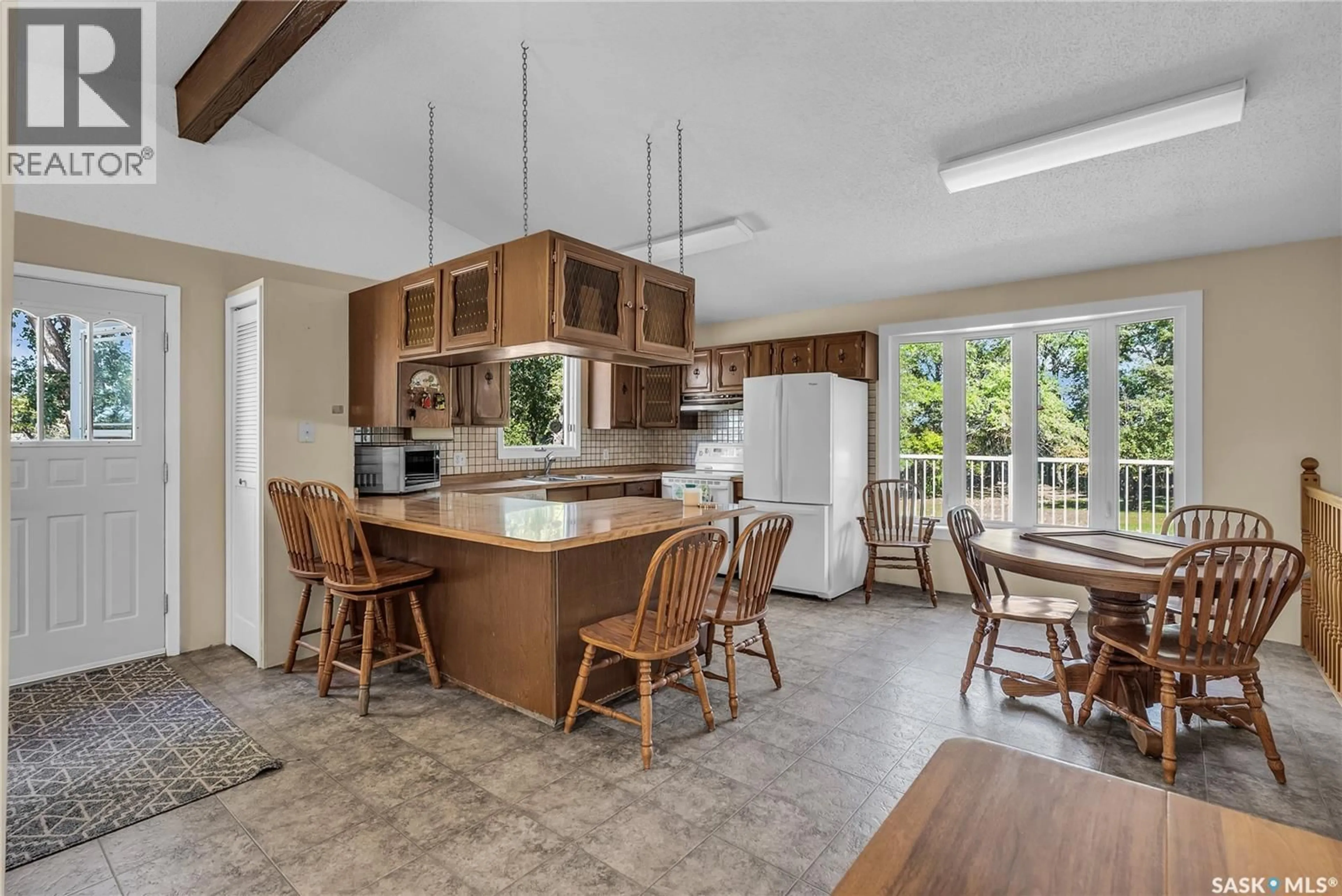 Open concept kitchen, ceramic/tile floor for MAY ACREAGE, Biggar Rm No. 347 Saskatchewan S0K0M0