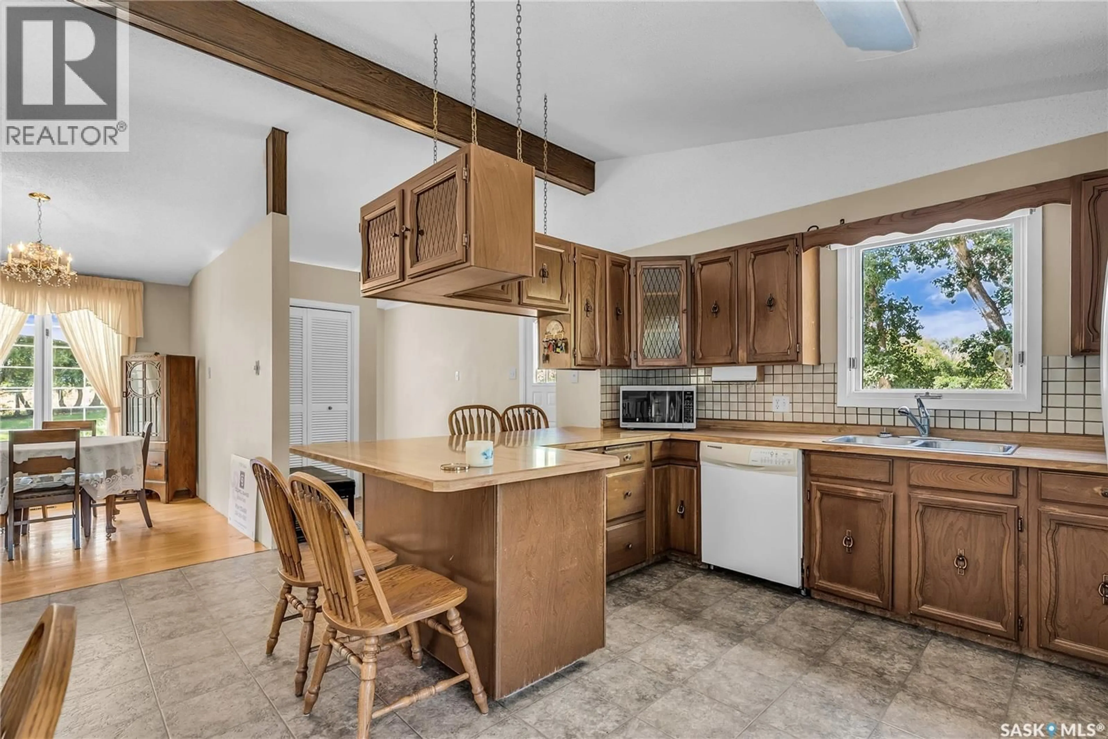 Open concept kitchen, ceramic/tile floor for MAY ACREAGE, Biggar Rm No. 347 Saskatchewan S0K0M0