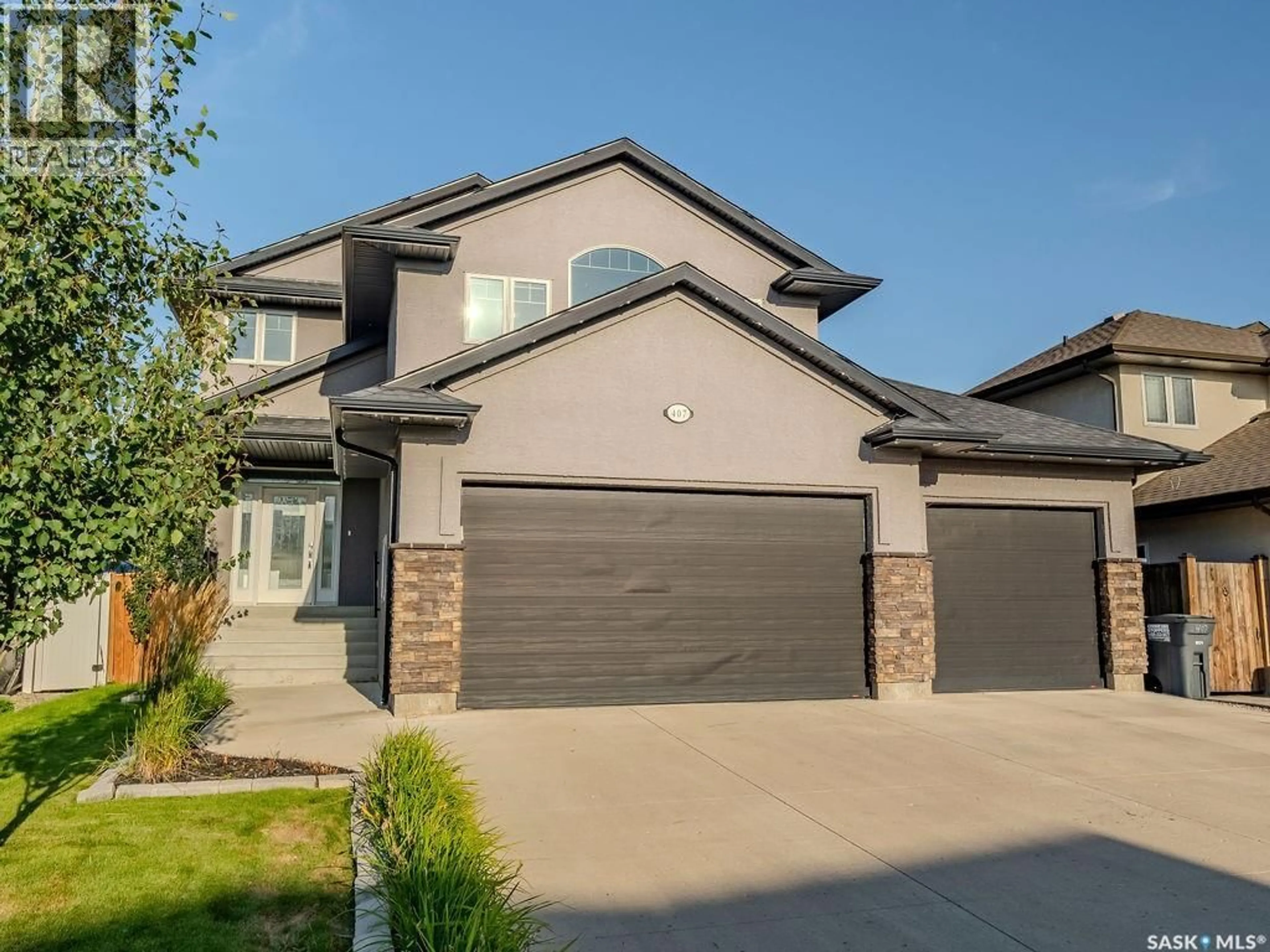 Home with brick exterior material, street for 407 GILLIES WAY, Saskatoon Saskatchewan S7V0C1
