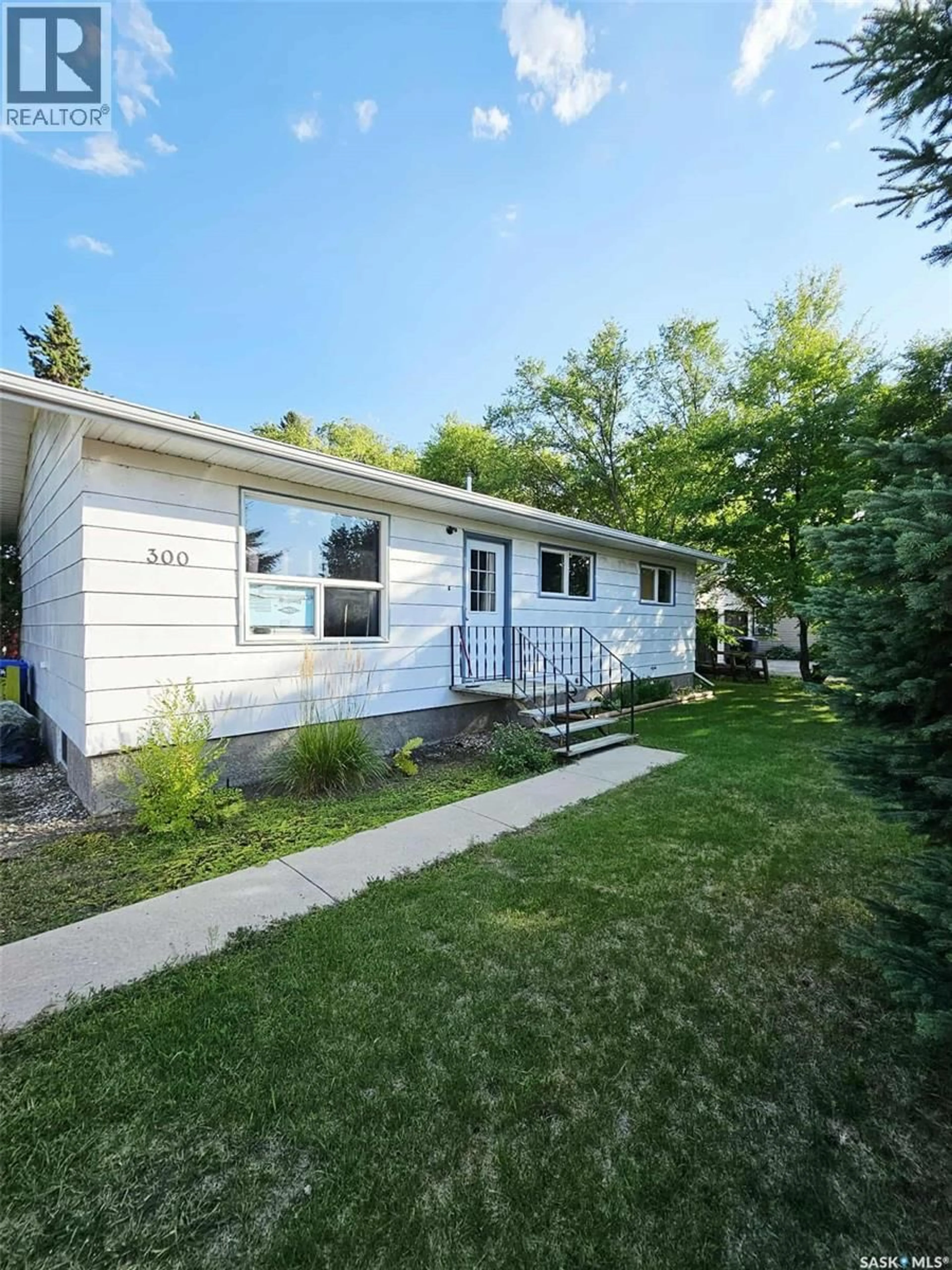 Home with vinyl exterior material, street for 300 4TH STREET, Bredenbury Saskatchewan S0A0H0