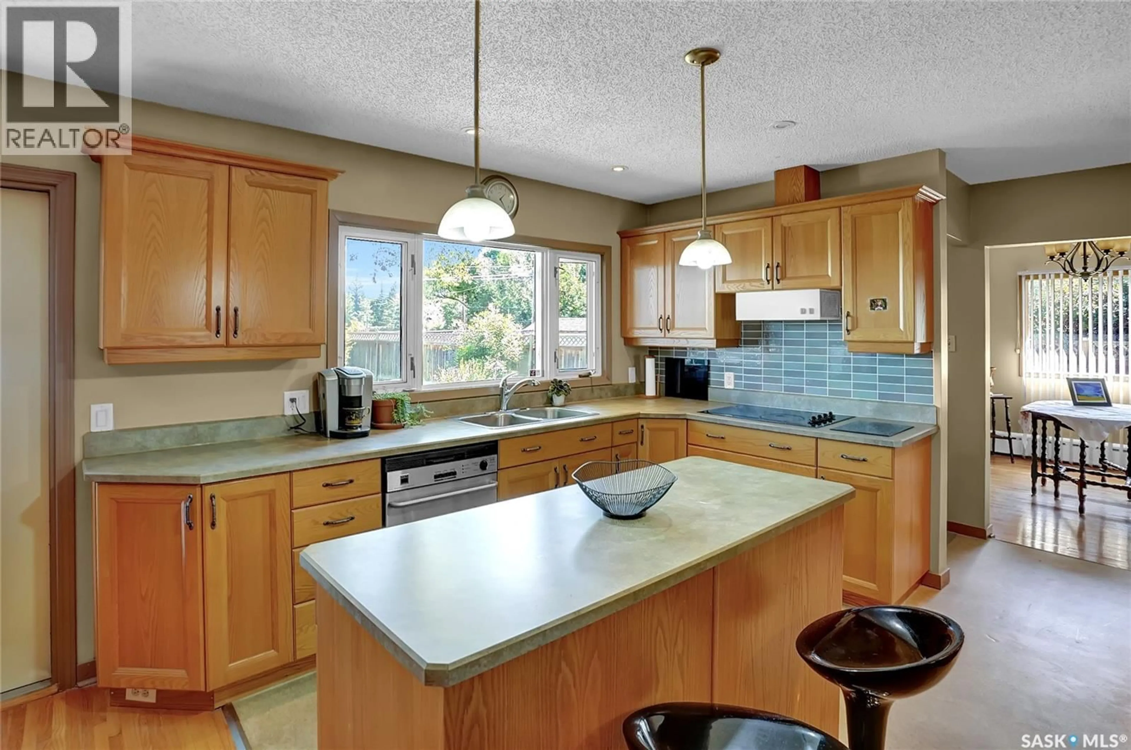 Open concept kitchen, ceramic/tile floor for 3212 L'ARCHE CRESCENT, Regina Saskatchewan S4S5V8