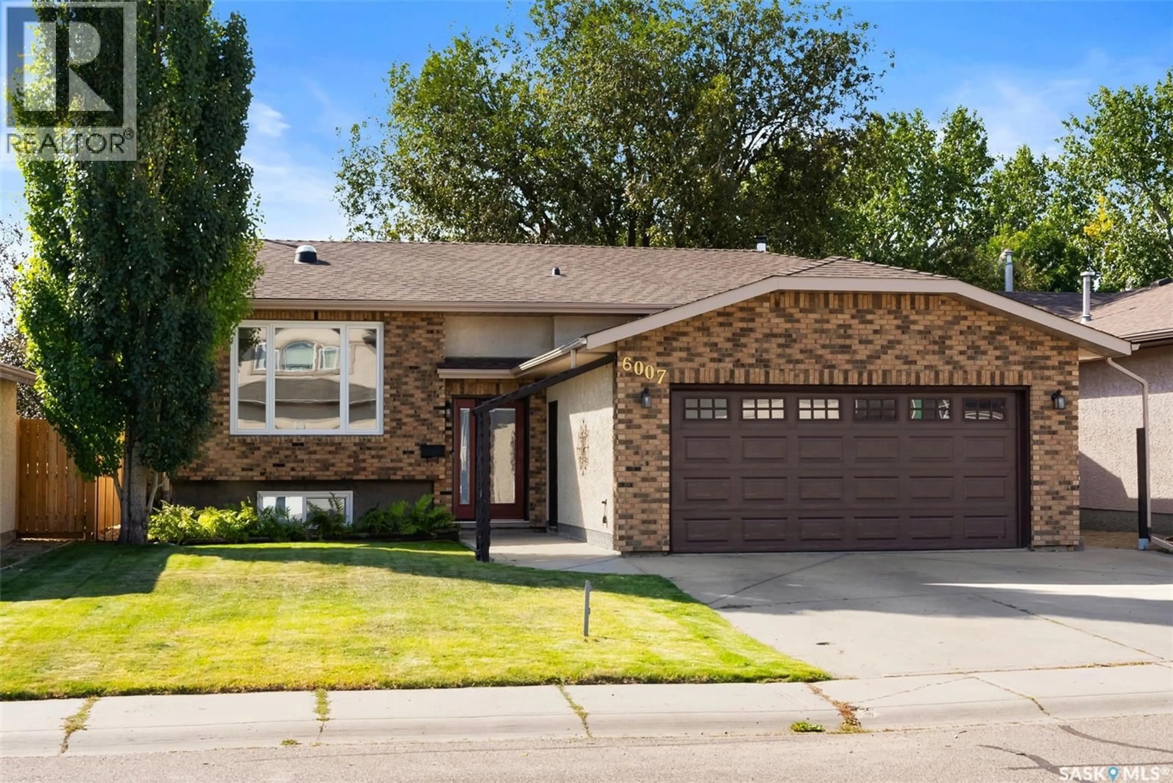 Home with brick exterior material, street for 6007 EHRLE CRESCENT, Regina Saskatchewan S4X4C8