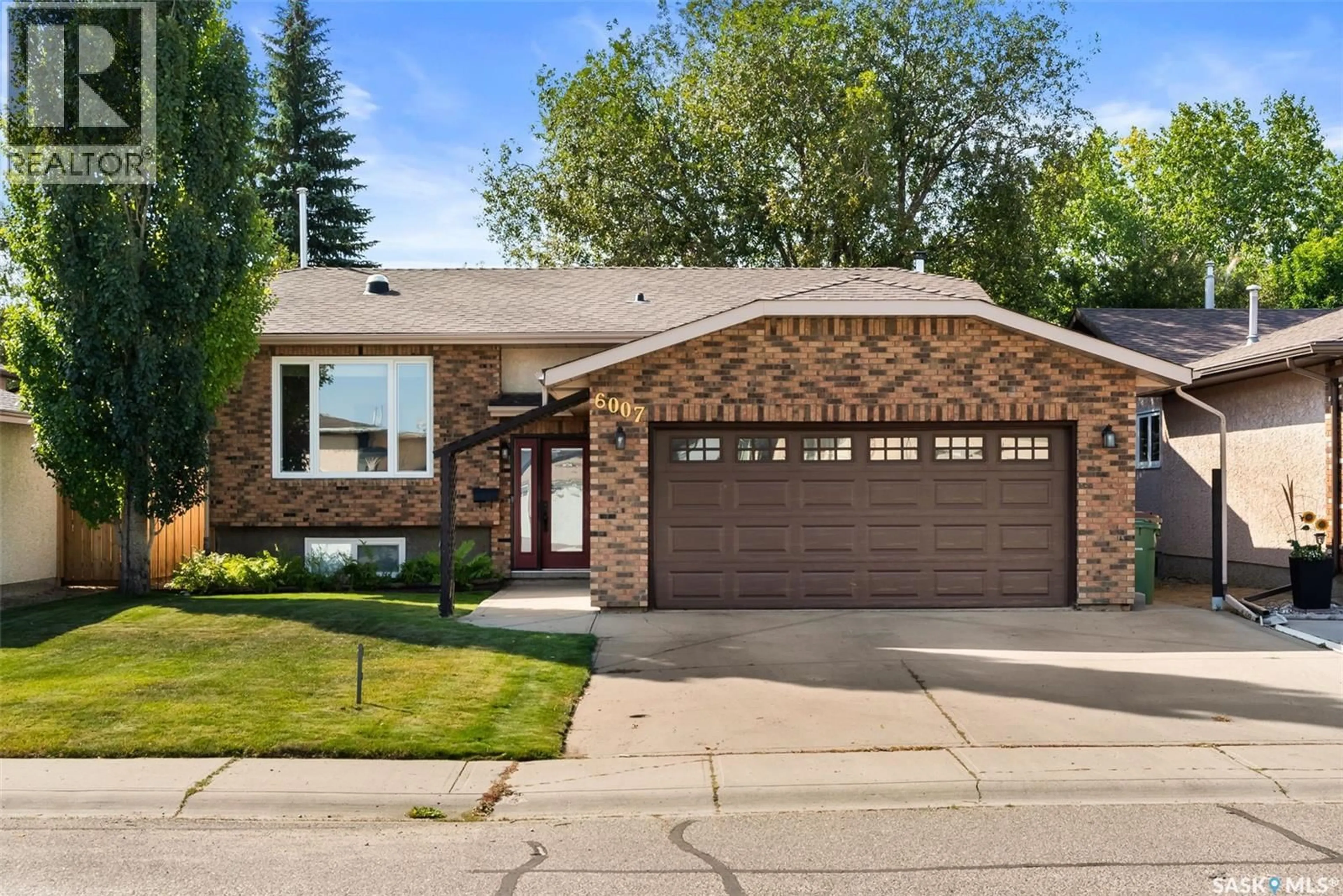 Home with brick exterior material, street for 6007 EHRLE CRESCENT, Regina Saskatchewan S4X4C8