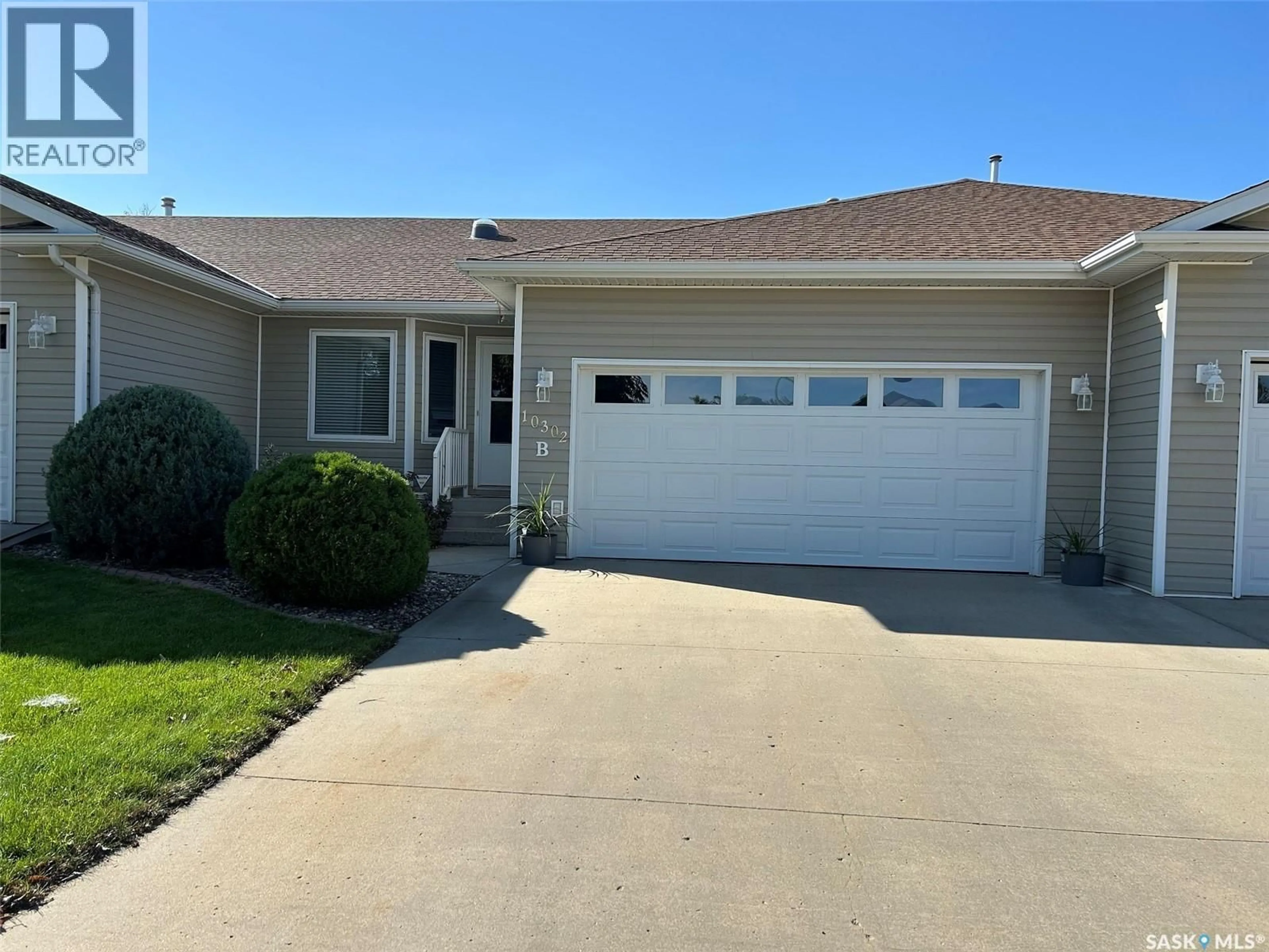 Home with vinyl exterior material, street for B - 10302 HENDERSON DRIVE, North Battleford Saskatchewan S9A3Y3