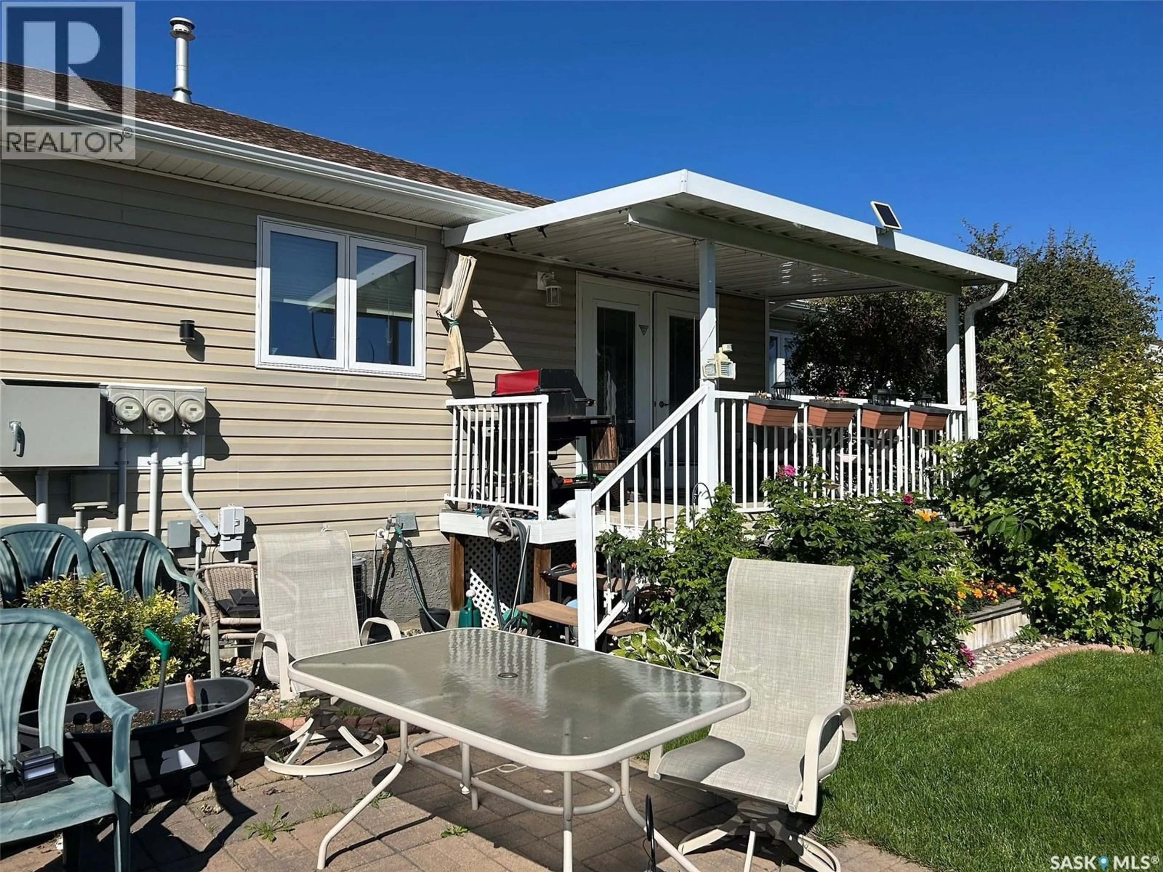 Patio, street for B - 10302 HENDERSON DRIVE, North Battleford Saskatchewan S9A3Y3