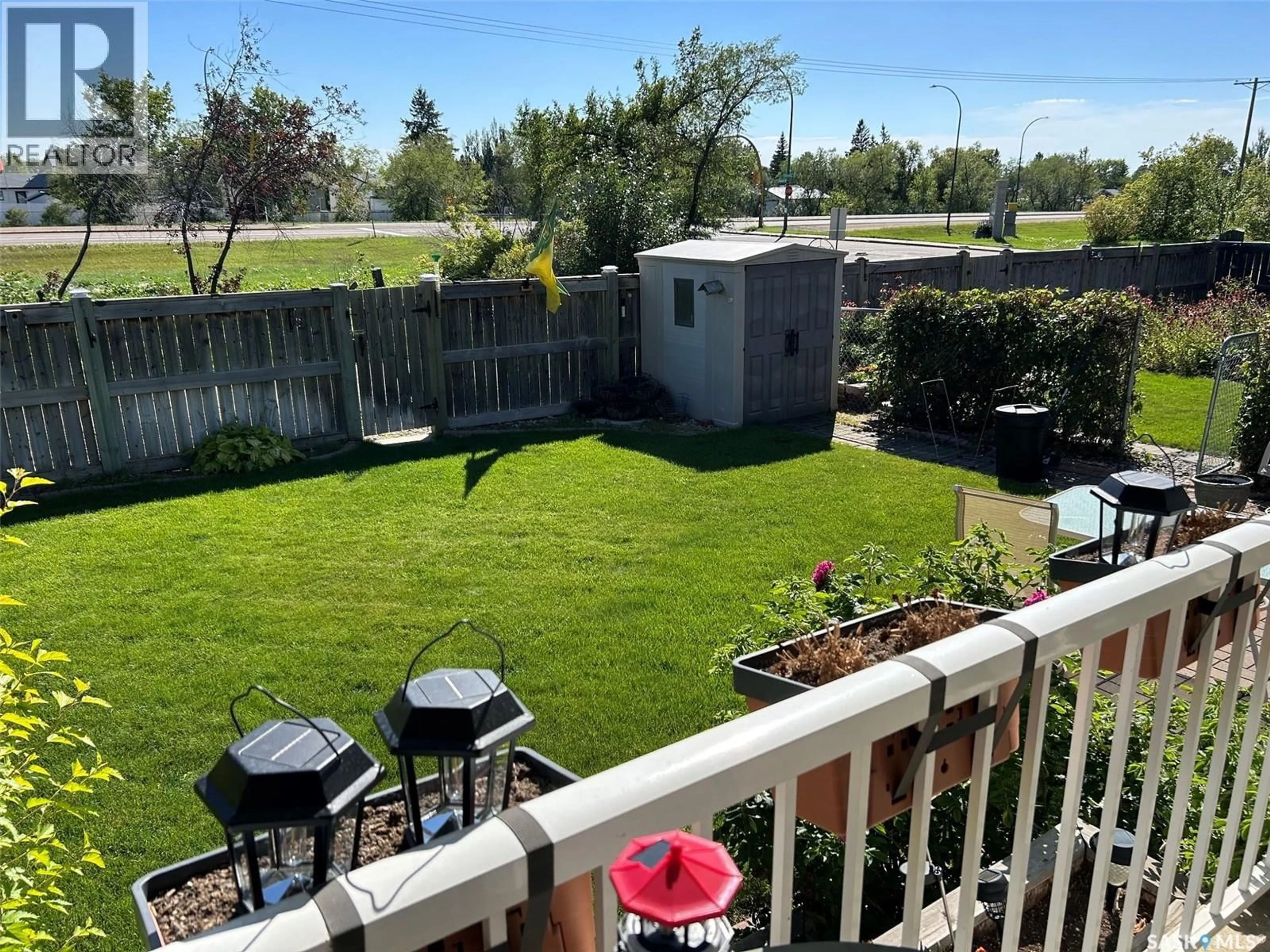 A pic from outside/outdoor area/front of a property/back of a property/a pic from drone, water/lake/river/ocean view for B - 10302 HENDERSON DRIVE, North Battleford Saskatchewan S9A3Y3