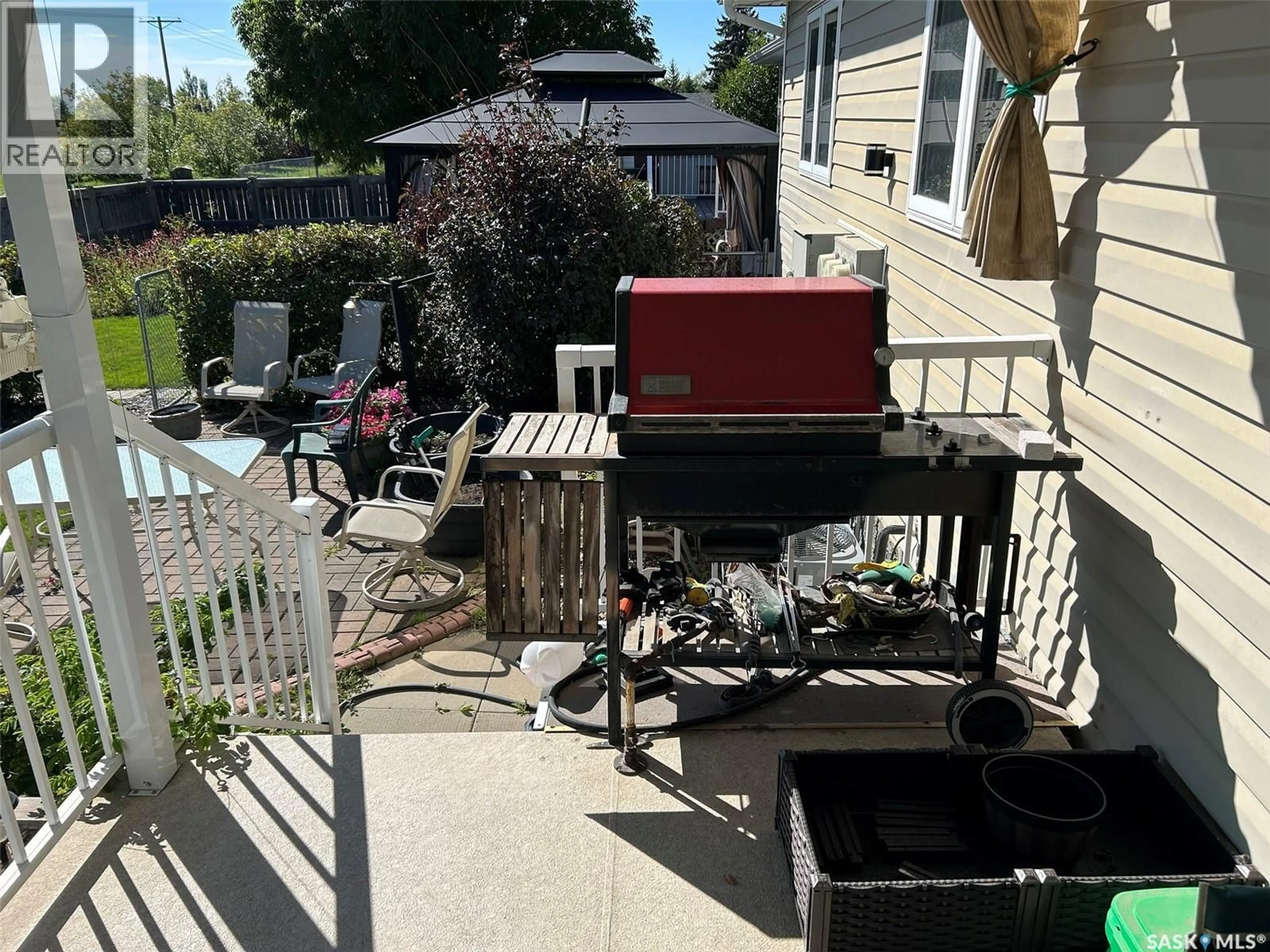 Patio, street for B - 10302 HENDERSON DRIVE, North Battleford Saskatchewan S9A3Y3
