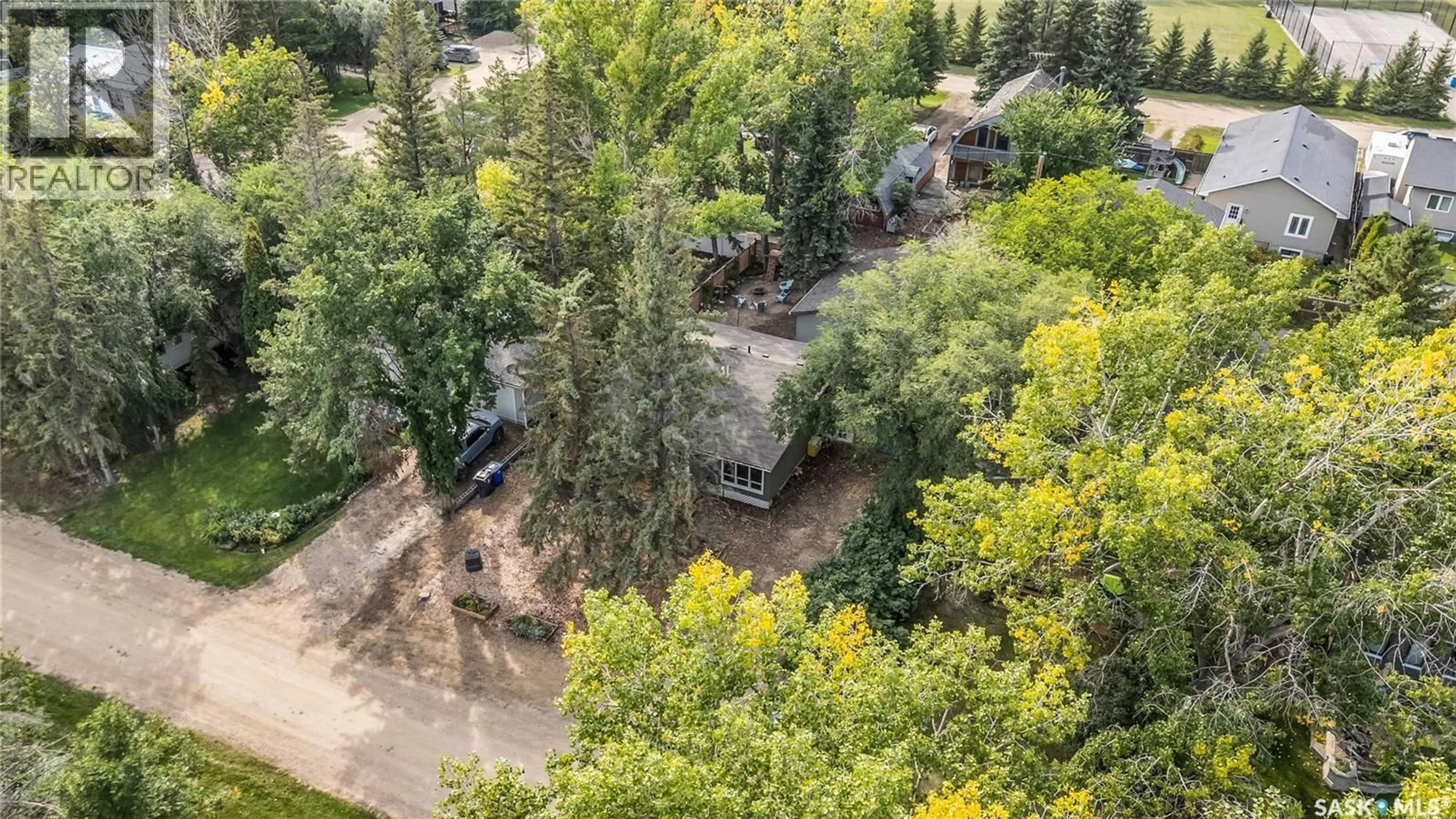 A pic from outside/outdoor area/front of a property/back of a property/a pic from drone, forest/trees view for 16 HORDERN STREET, Shields Saskatchewan S7C0A1