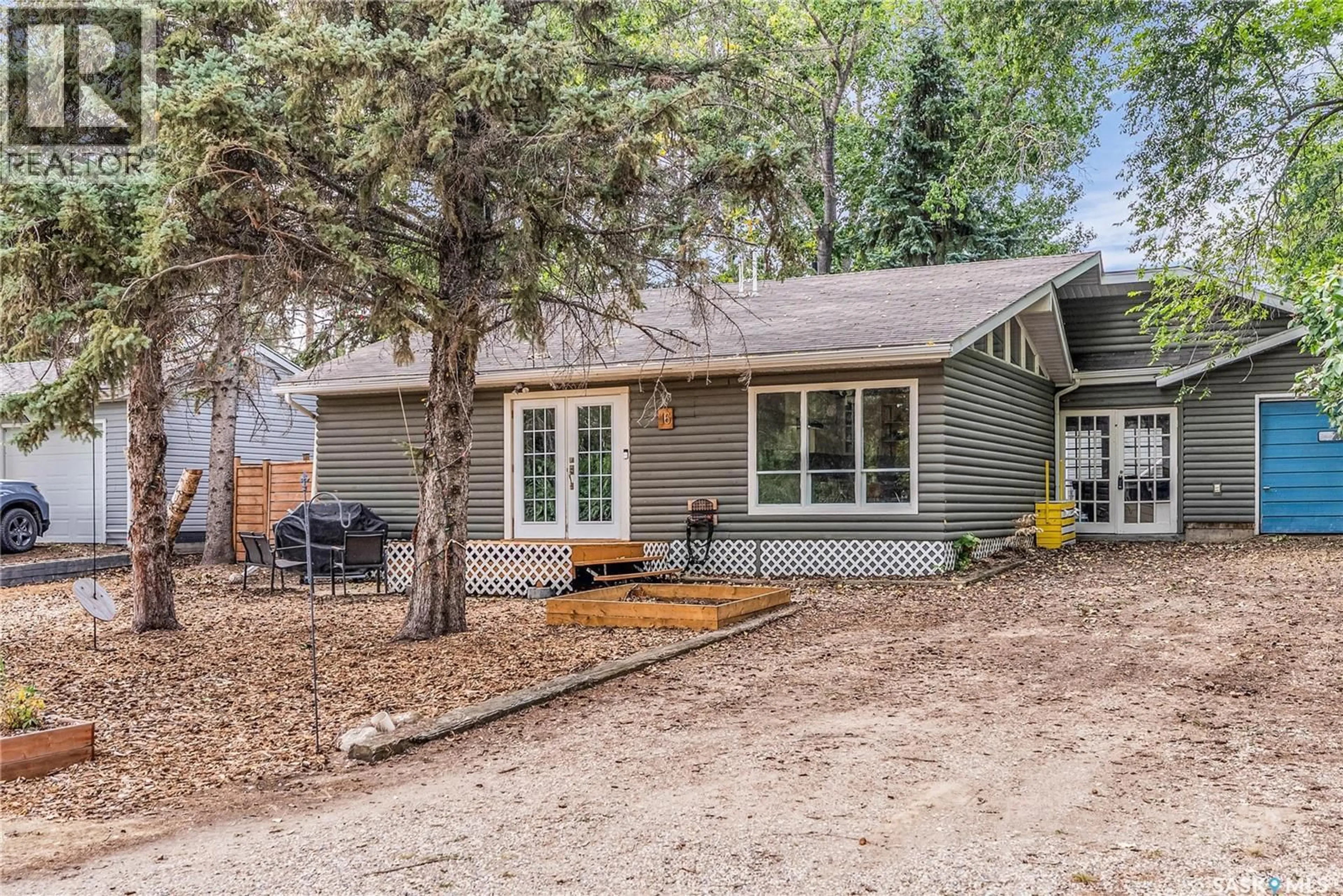 Home with vinyl exterior material, street for 16 HORDERN STREET, Shields Saskatchewan S7C0A1