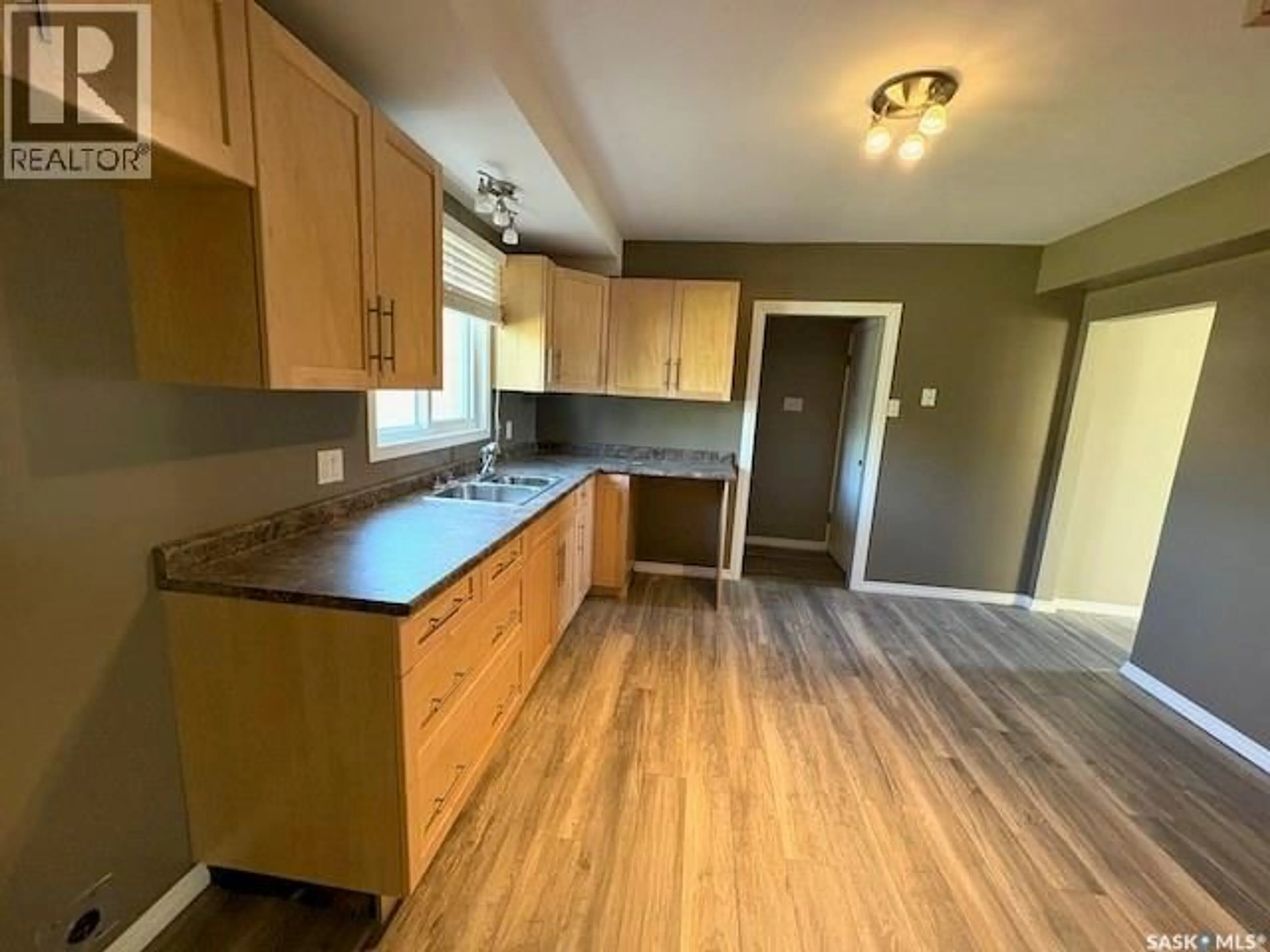 Standard kitchen, wood/laminate floor for 209 3RD AVENUE, Kyle Saskatchewan S0L1T0
