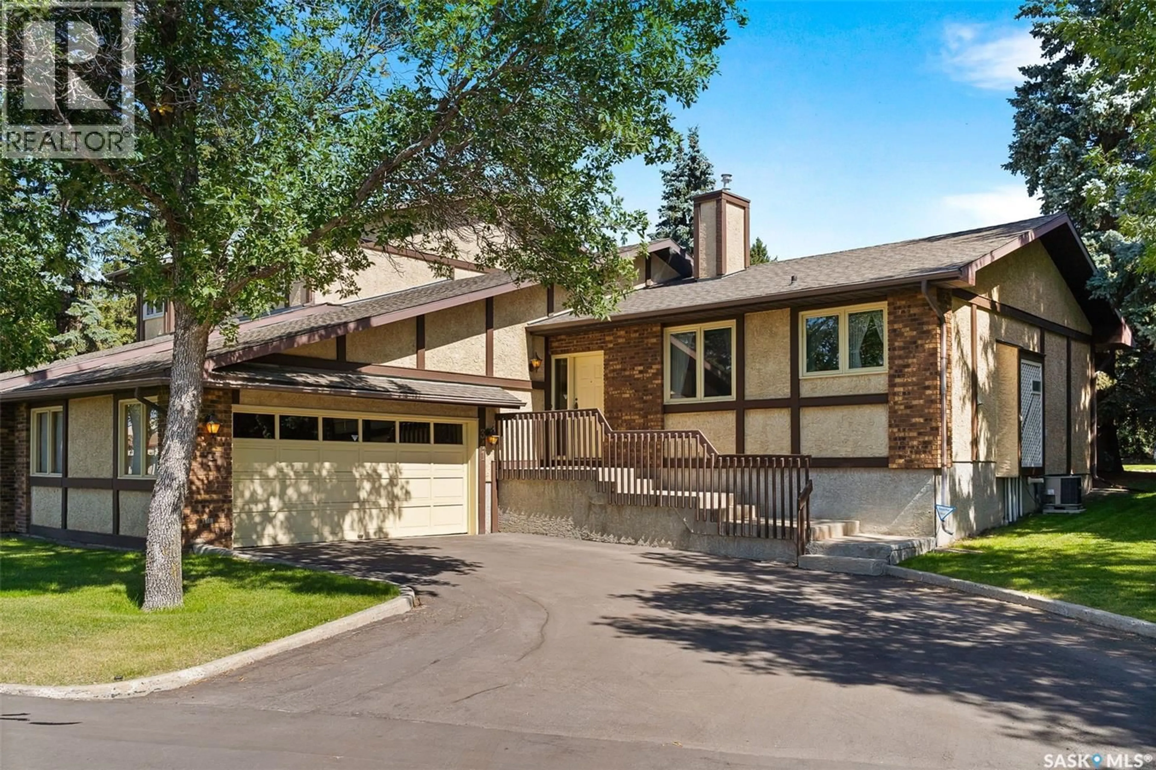 Home with vinyl exterior material, street for 341 AVON DRIVE, Regina Saskatchewan S4V1L8